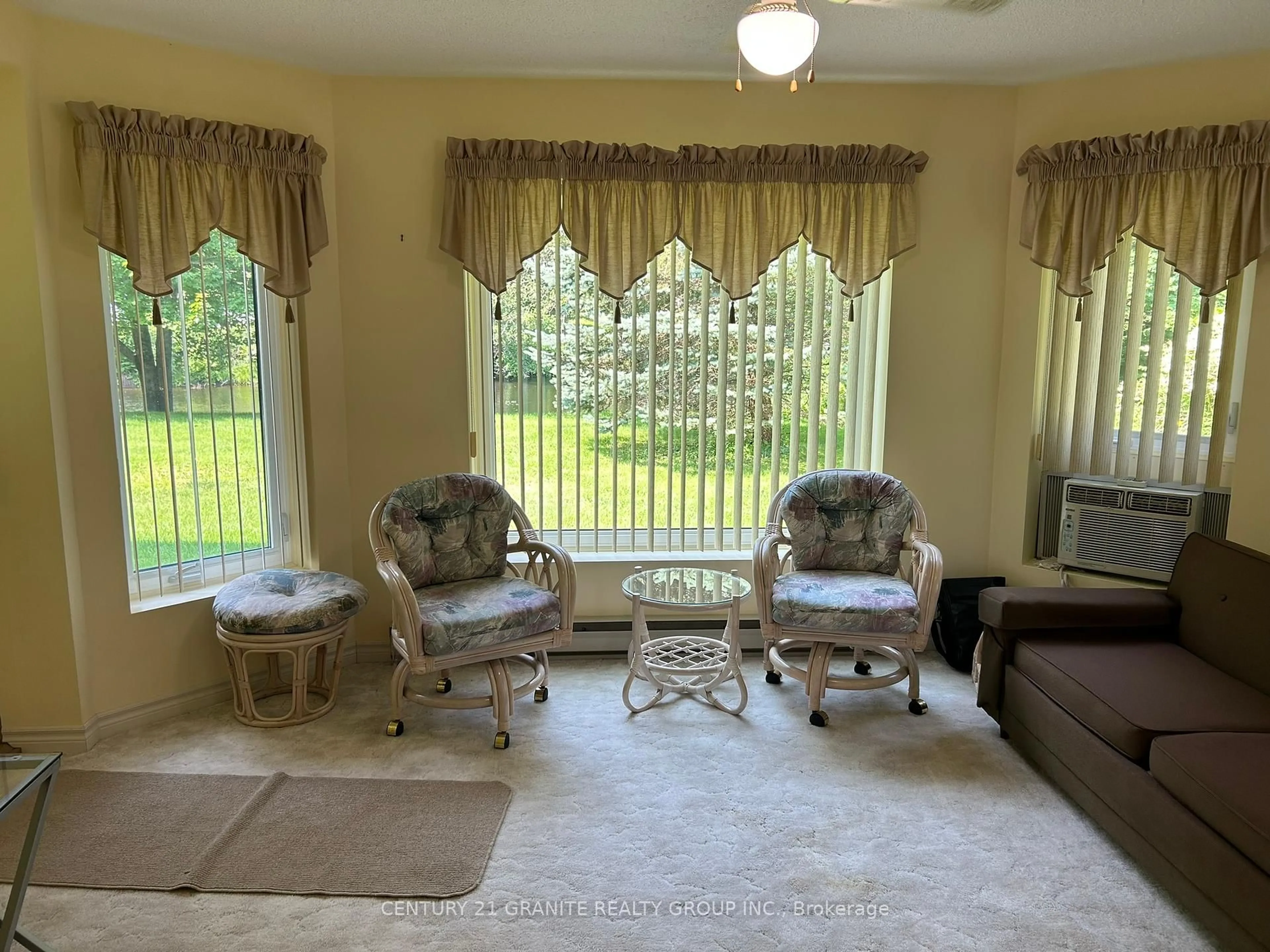 Living room with furniture, carpet floor for 16 Alice St, Bancroft Ontario K0L 1C0