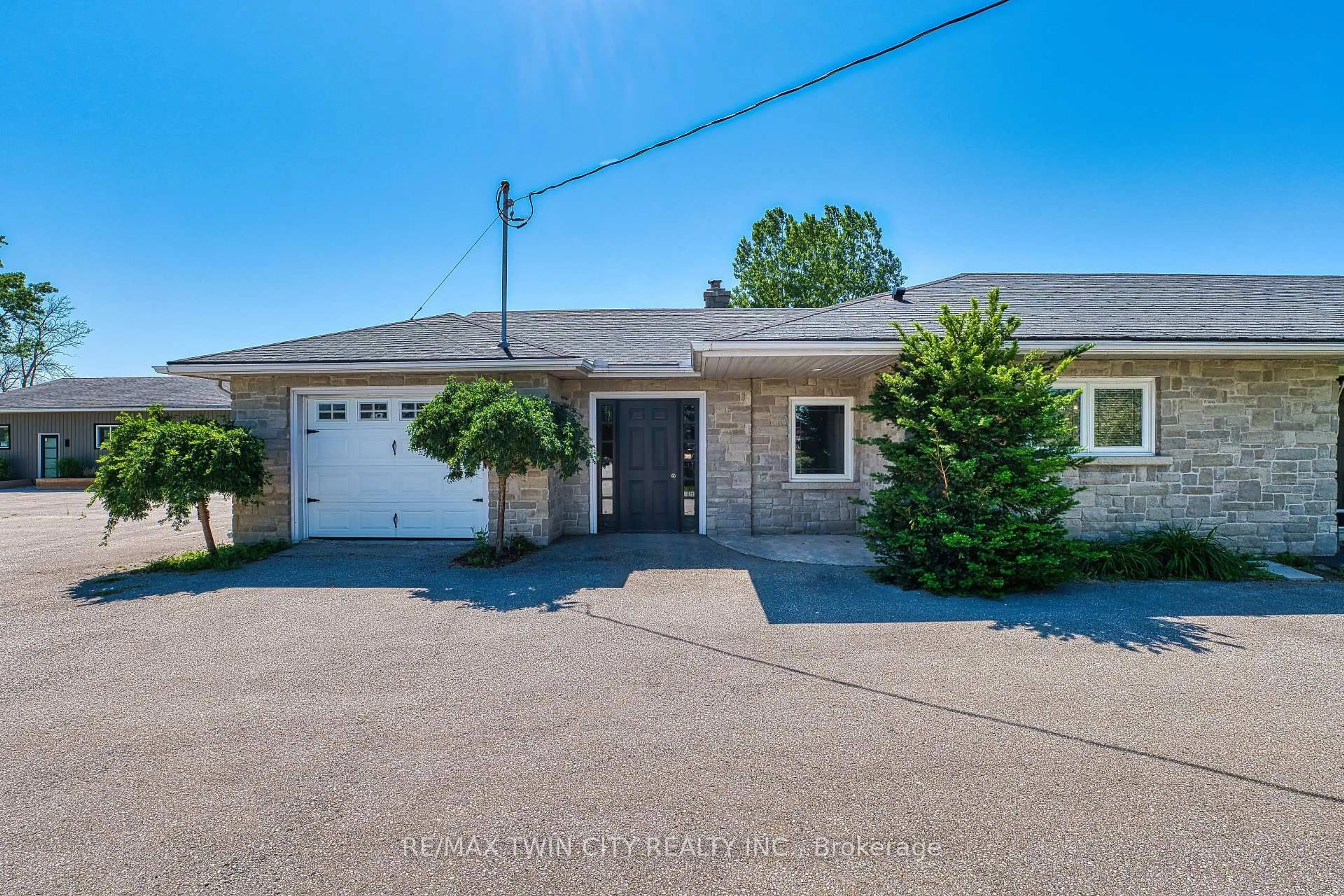 A pic from outside/outdoor area/front of a property/back of a property/a pic from drone, street for 717906 HIGHWAY 6, Owen Sound Ontario N4K 5N7