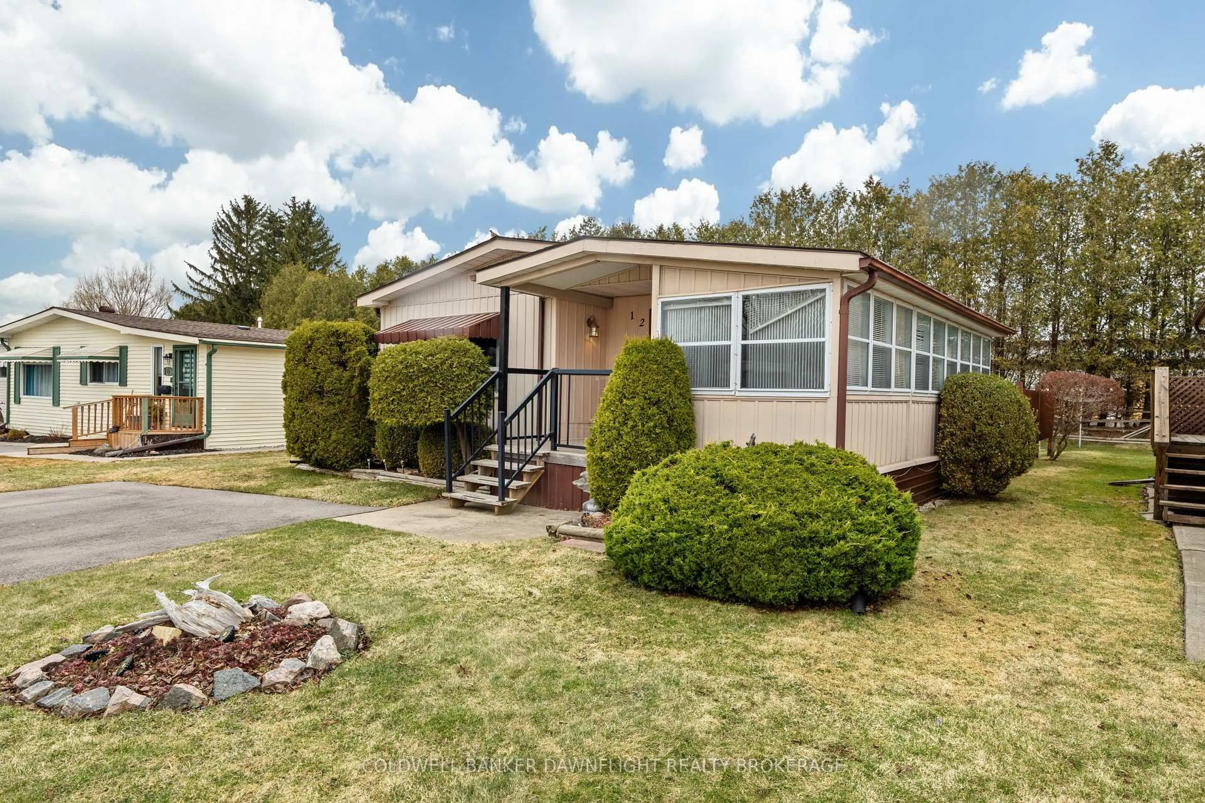 Home with vinyl exterior material, street for 12 Redford Dr, South Huron Ontario N0M 1S3