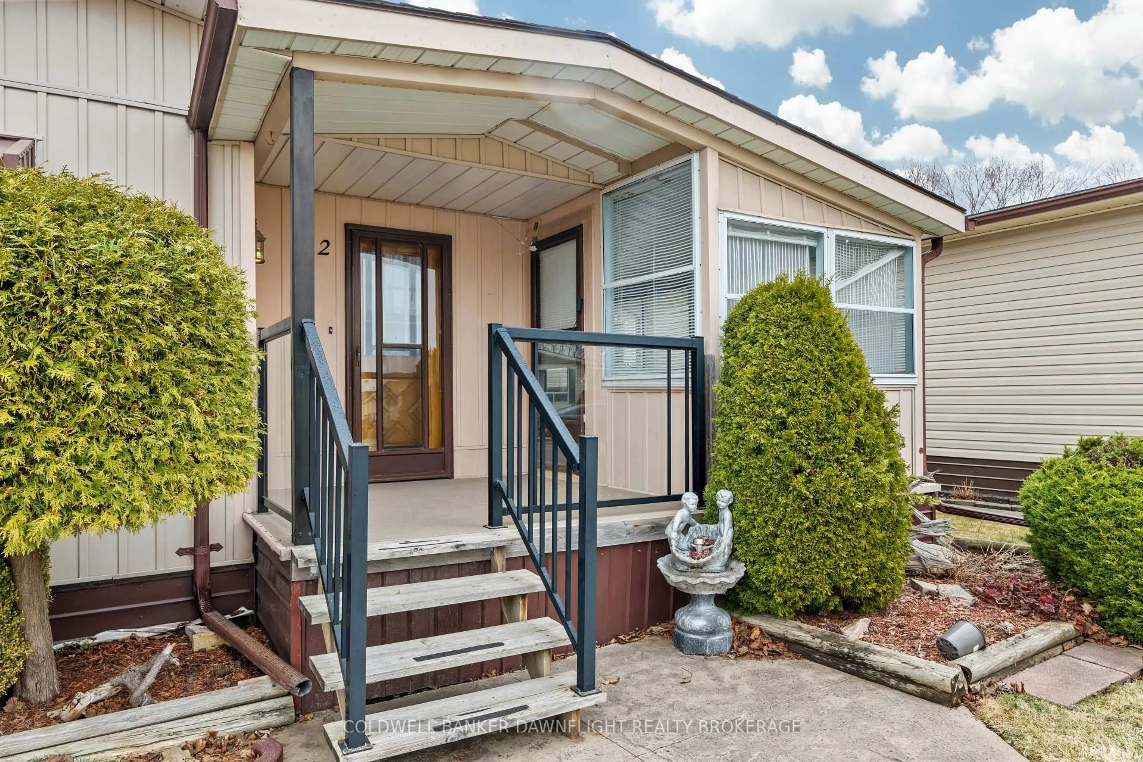 Home with vinyl exterior material, street for 12 Redford Dr, South Huron Ontario N0M 1S3