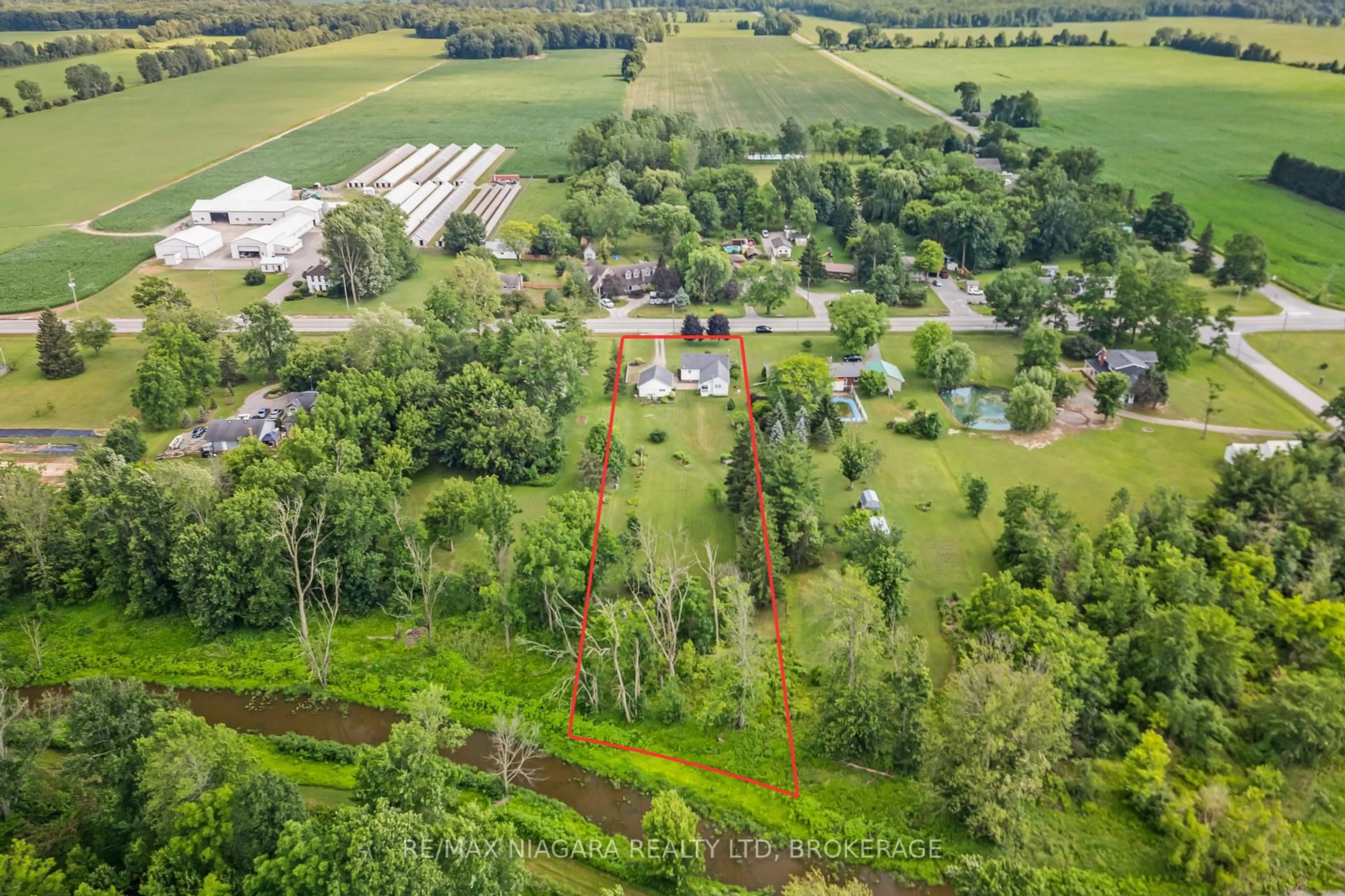 A pic from outside/outdoor area/front of a property/back of a property/a pic from drone, forest/trees view for 42574 3 Highway, Wainfleet Ontario L0S 1V0