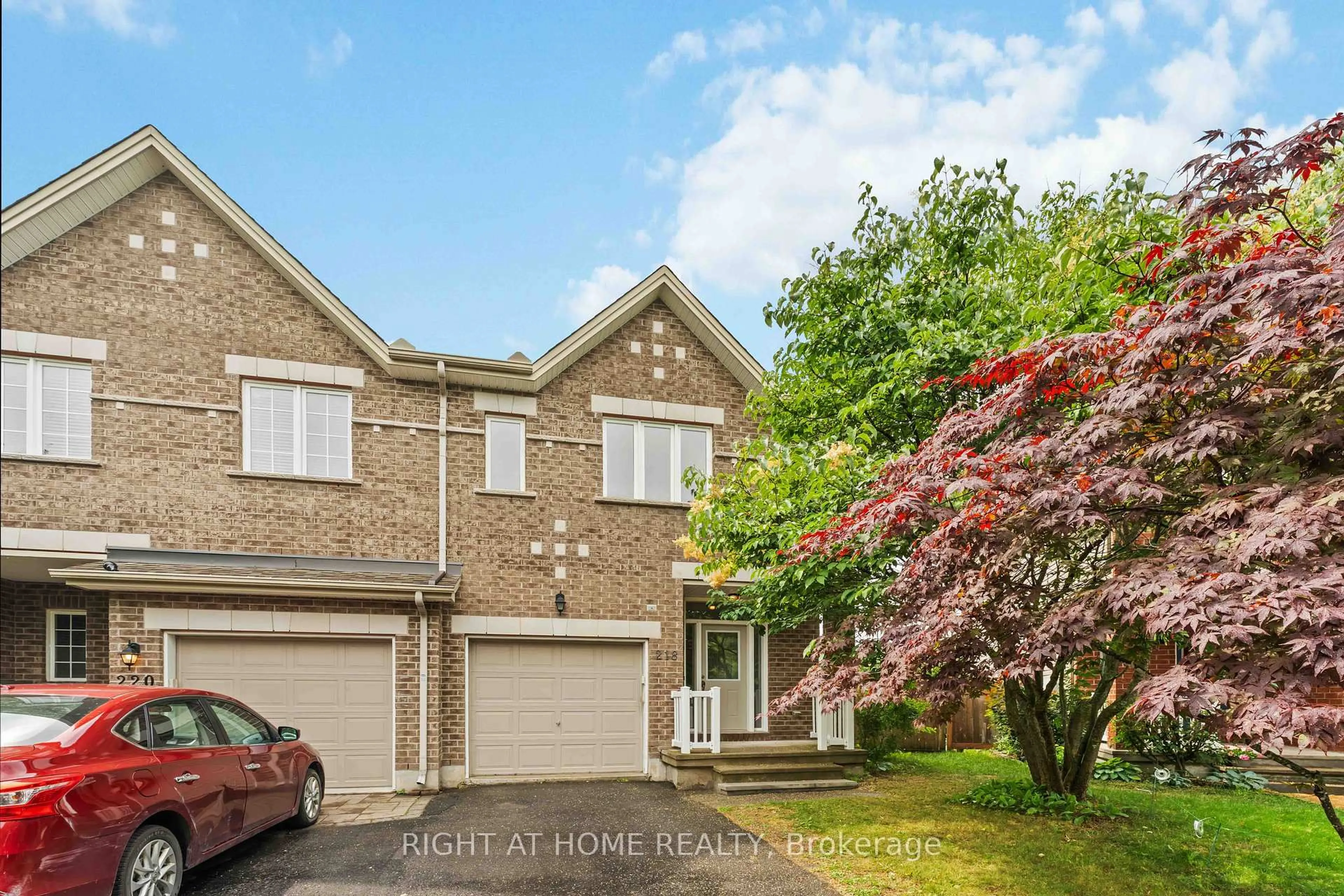 Home with brick exterior material, street for 218 Tandalee Cres, Ottawa Ontario K2M 0A2