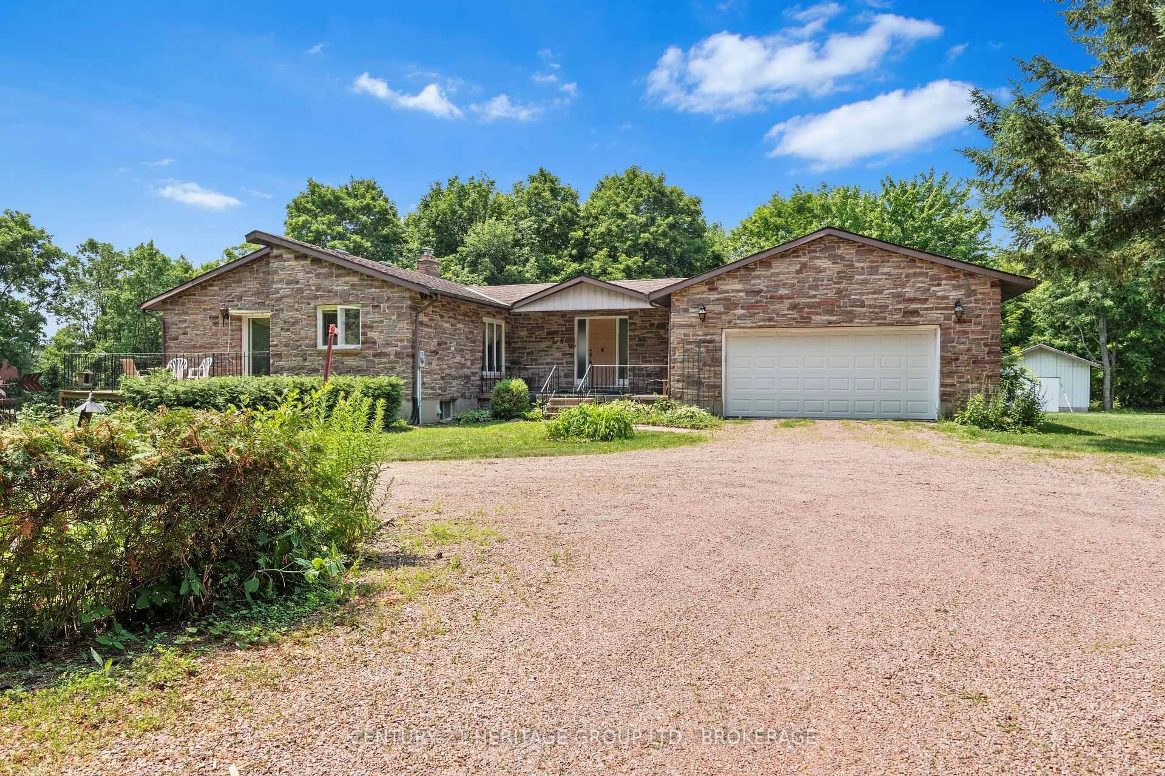 A pic from outside/outdoor area/front of a property/back of a property/a pic from drone, street for 1882 Sunbury Rd, Inverary Ontario K0H 1X0