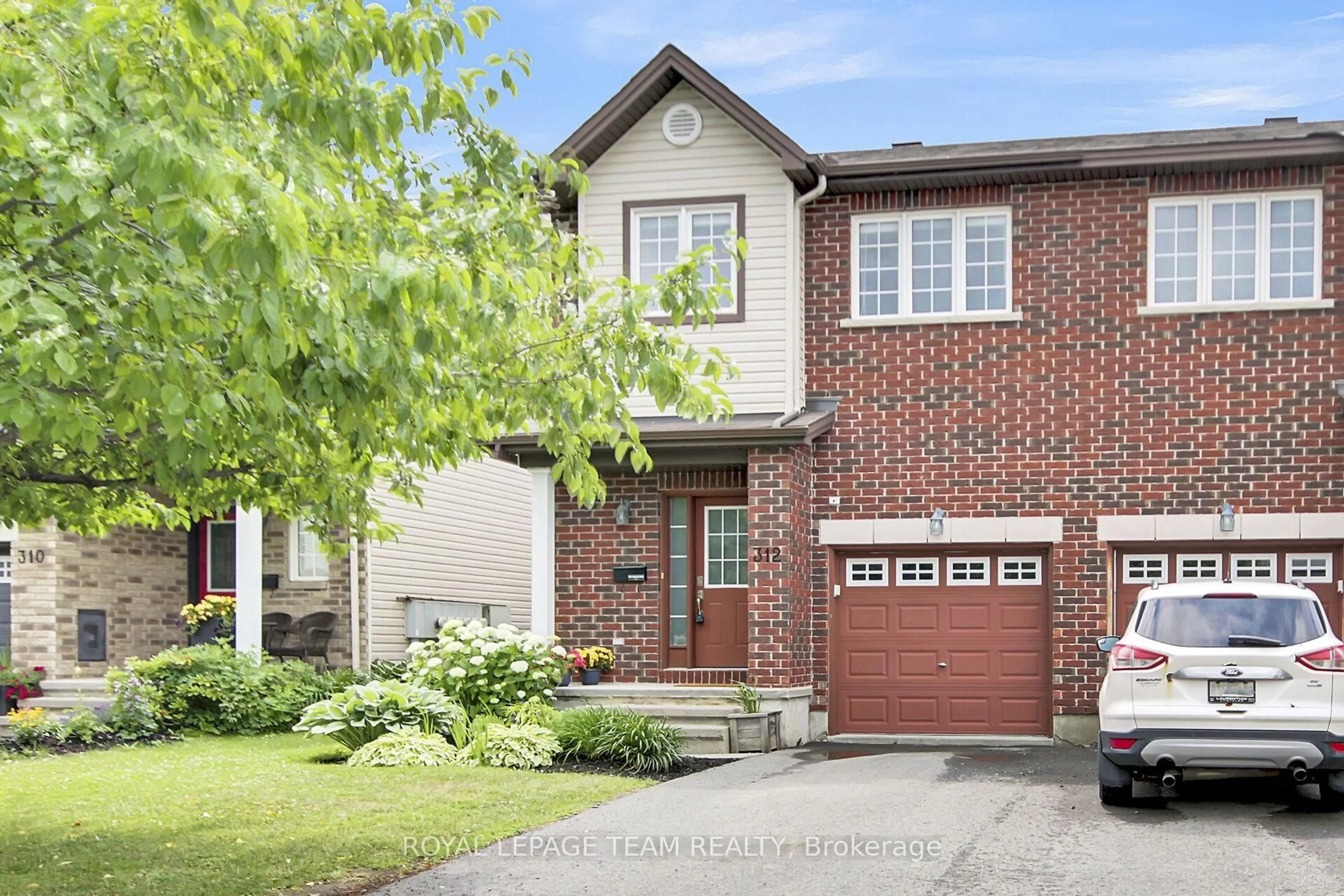 Home with brick exterior material, street for 312 Amici Terr, Ottawa Ontario K2S 0J6