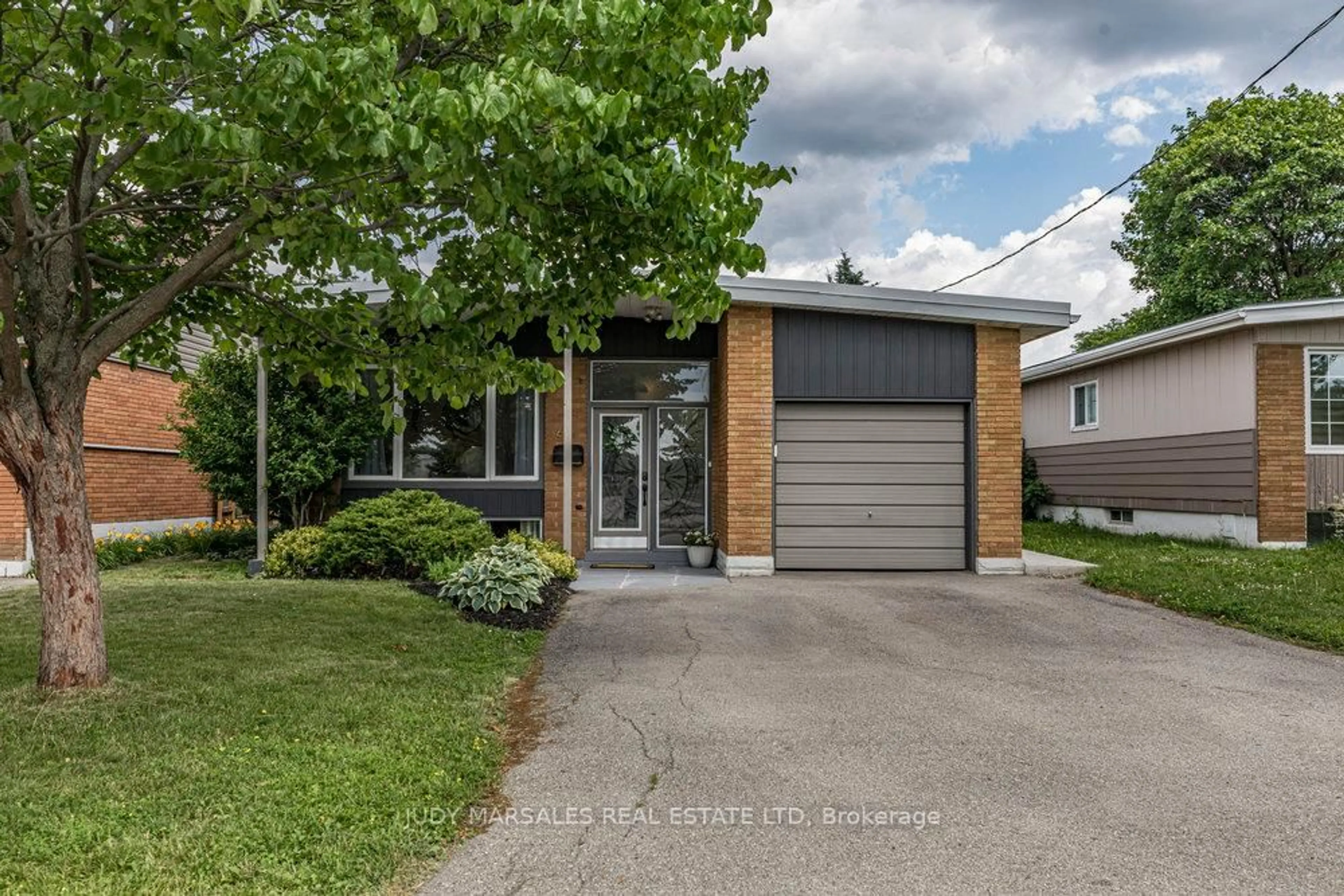 Home with brick exterior material, street for 65 Ronaldshay Ave, Hamilton Ontario L9A 3B2
