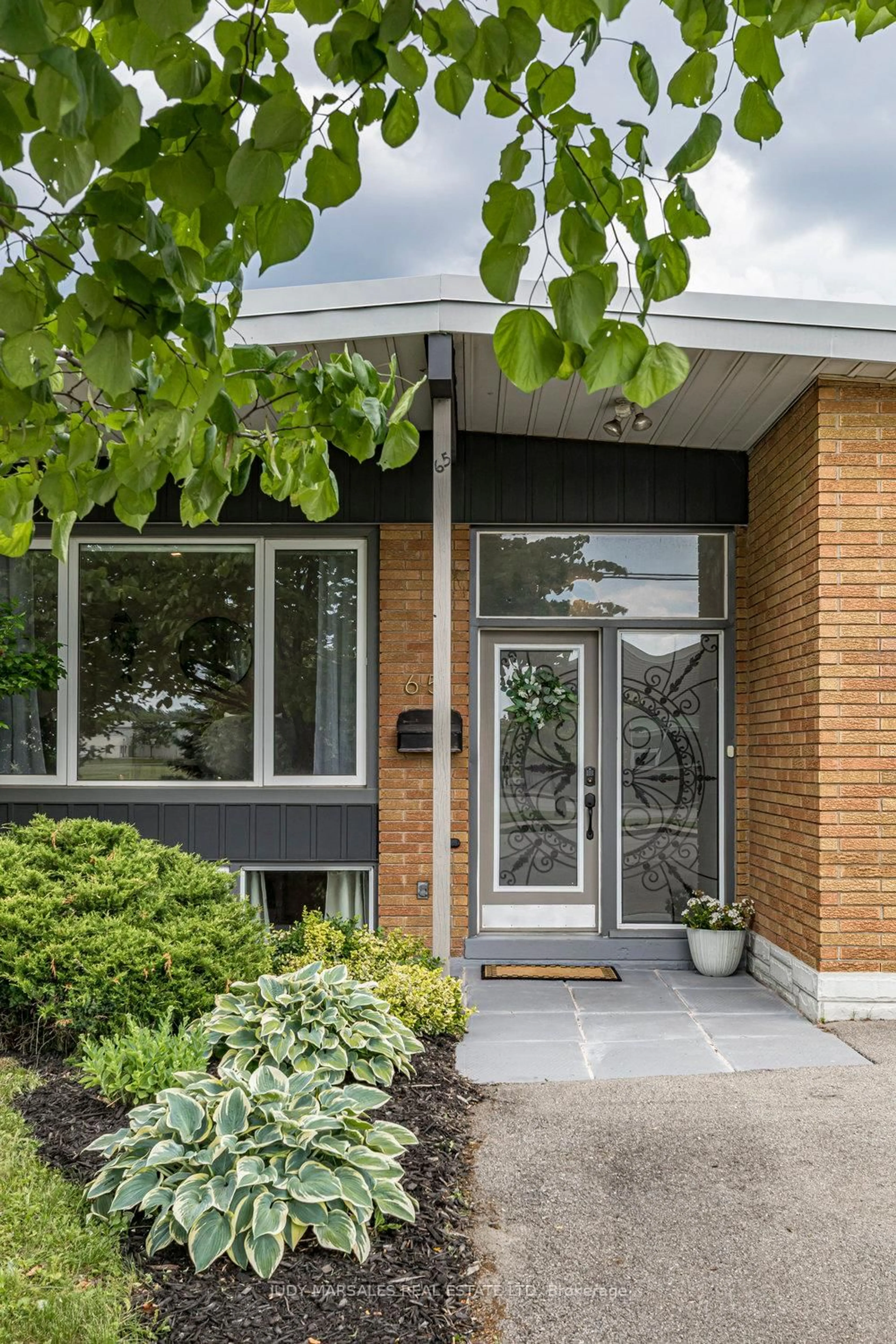 Home with brick exterior material, street for 65 Ronaldshay Ave, Hamilton Ontario L9A 3B2