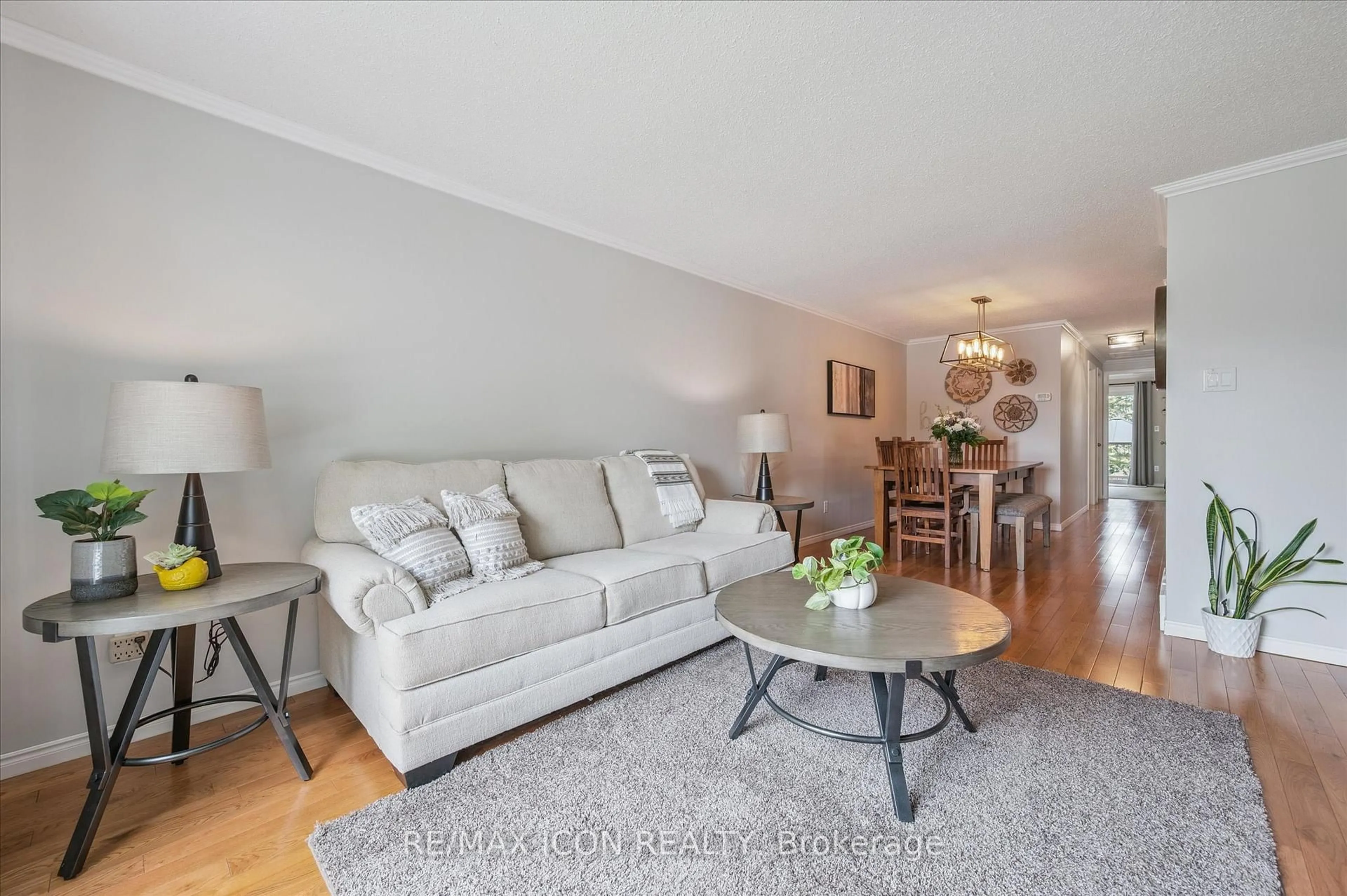 Living room with furniture, wood/laminate floor for 40 Abeles Ave, Brant Ontario N3L 3N9
