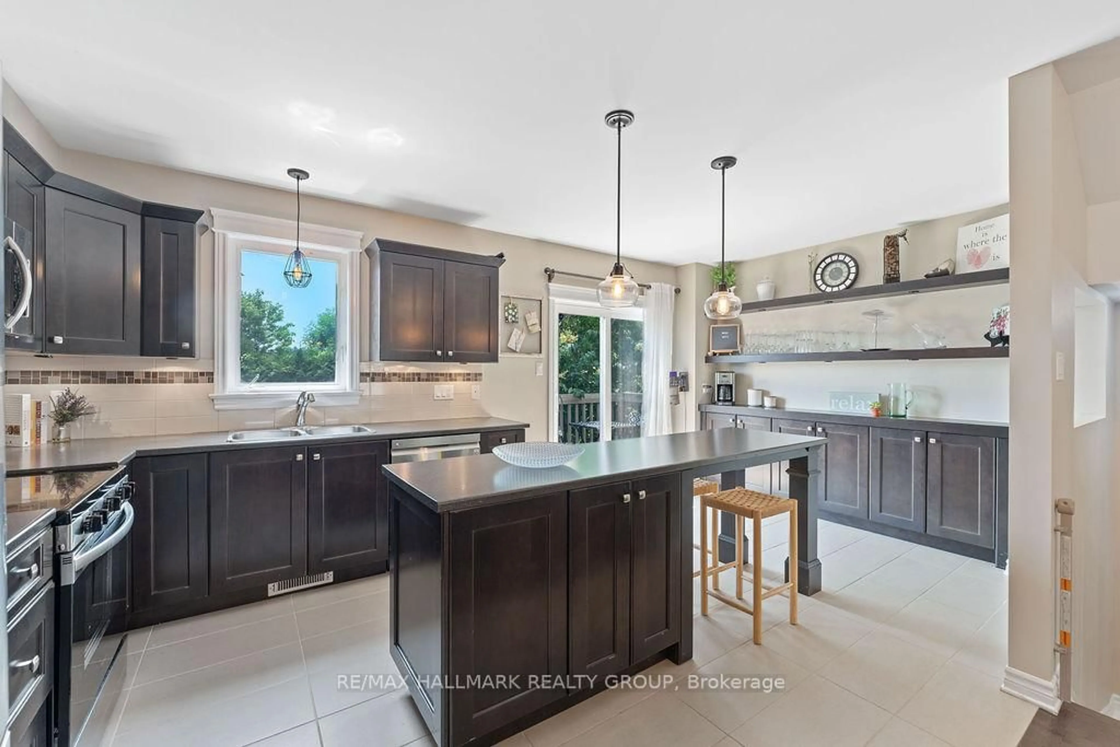 Open concept kitchen, ceramic/tile floor for 116 Brilia Private, Ottawa Ontario K1J 0B7