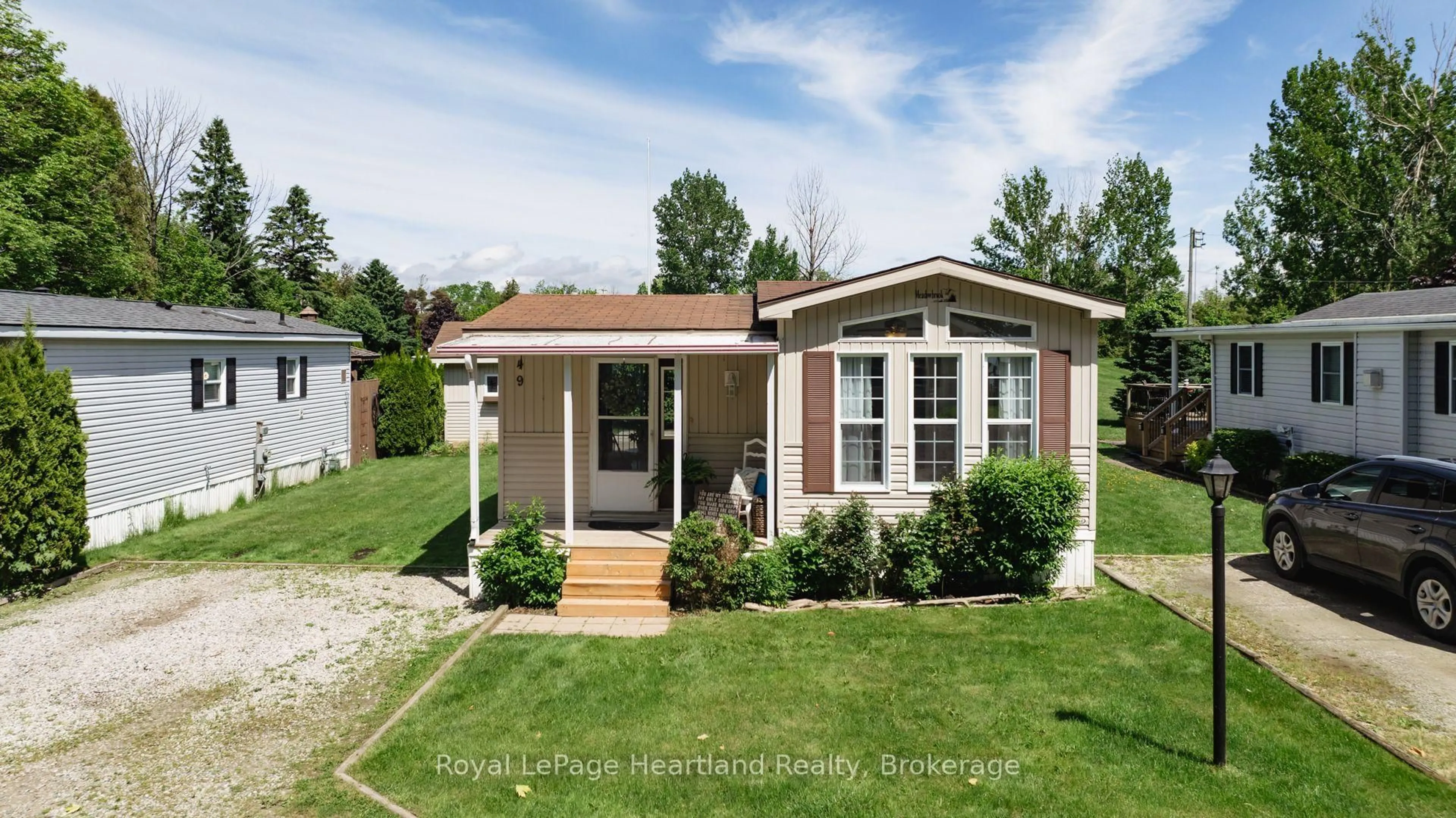 Home with vinyl exterior material, street for 77307 BLUEWATER HIGHWAY #49, Bluewater Ontario N0M 1G0