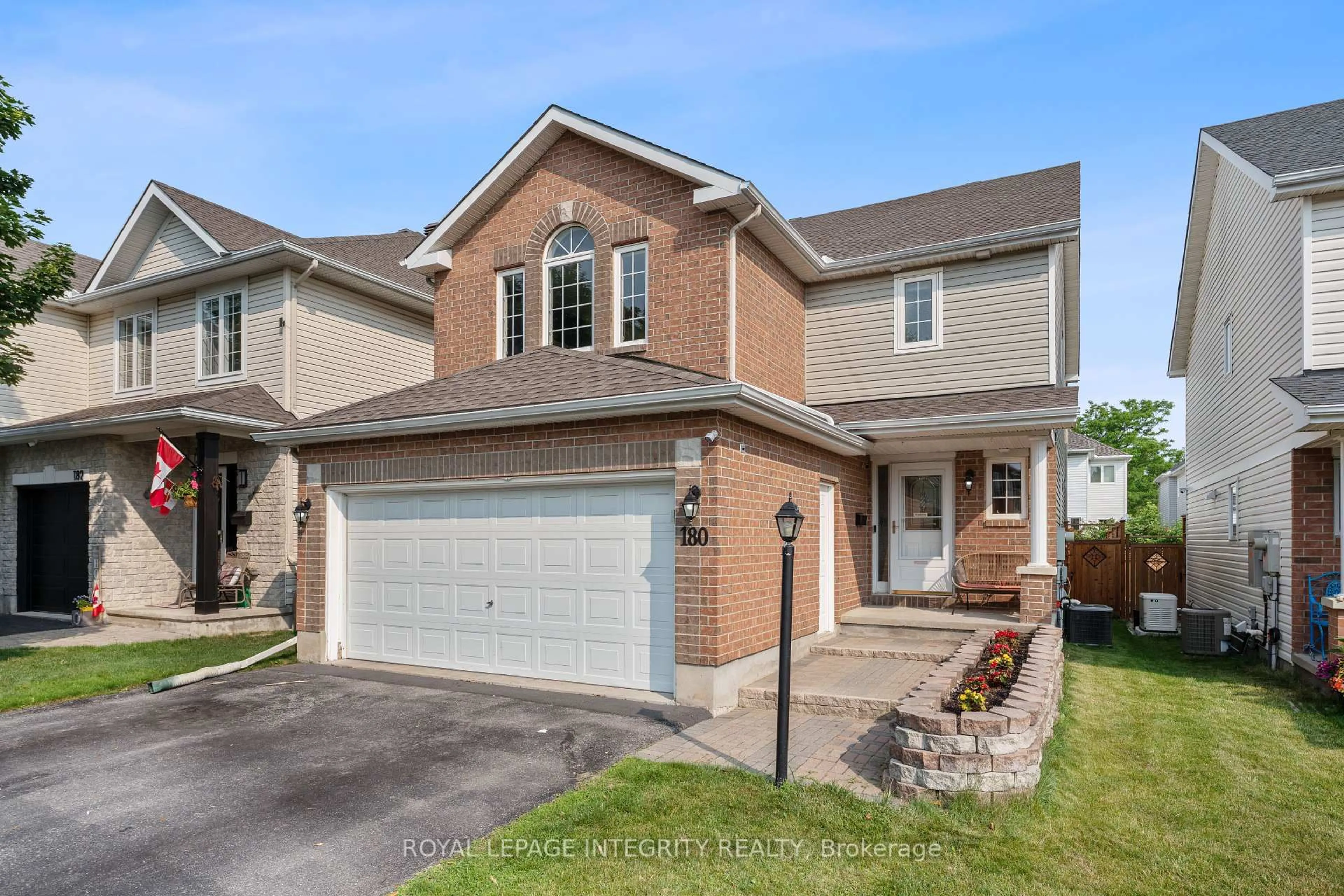 Home with brick exterior material, street for 180 Deerfox Dr, Ottawa Ontario K2J 4W8