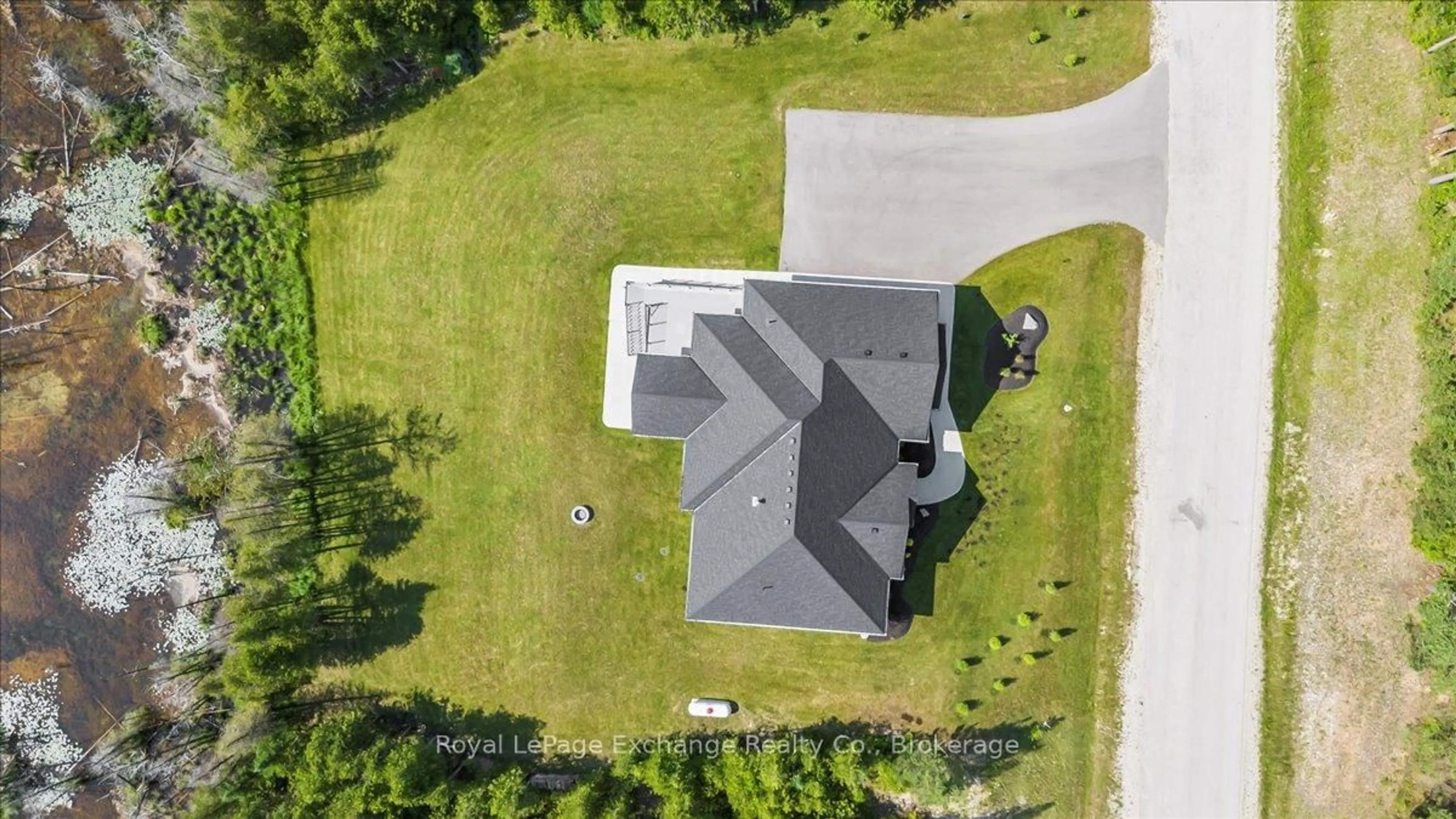 A pic from outside/outdoor area/front of a property/back of a property/a pic from drone, unknown for 150 Louise Creek Cres, West Grey Ontario N0G 1S0
