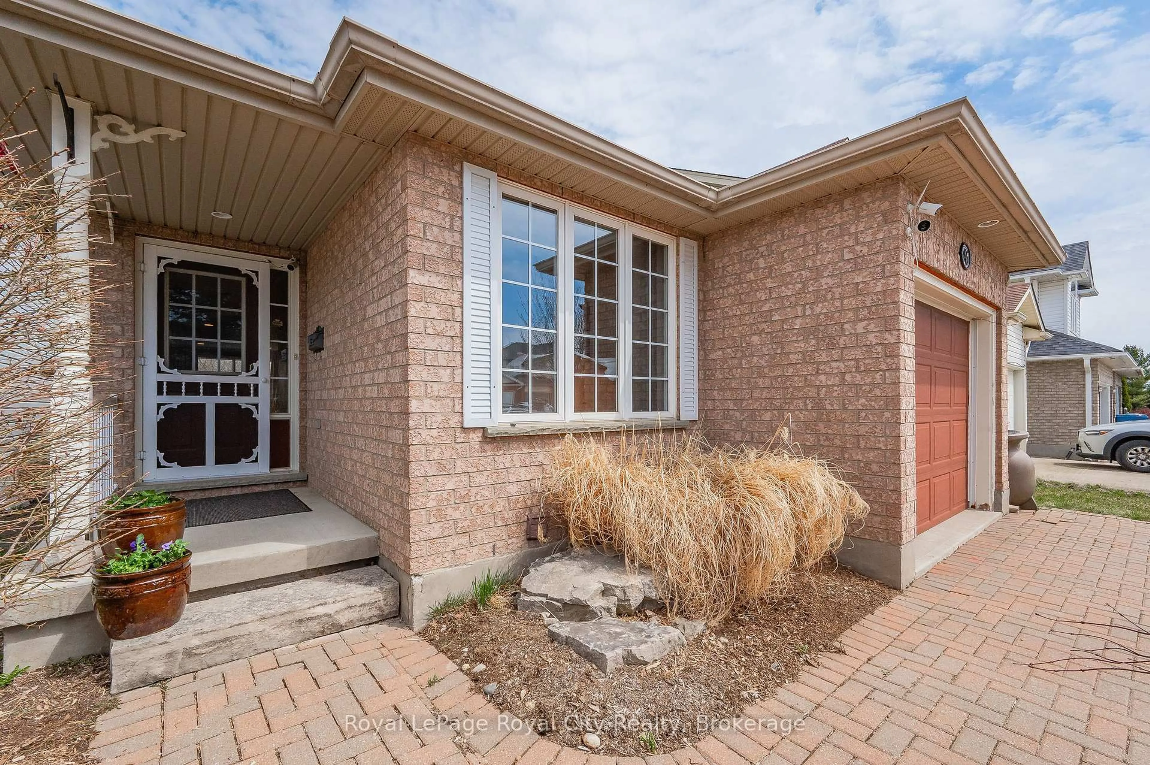 Home with brick exterior material, street for 46 FLETCHER Crt, Guelph Ontario N1E 7G8