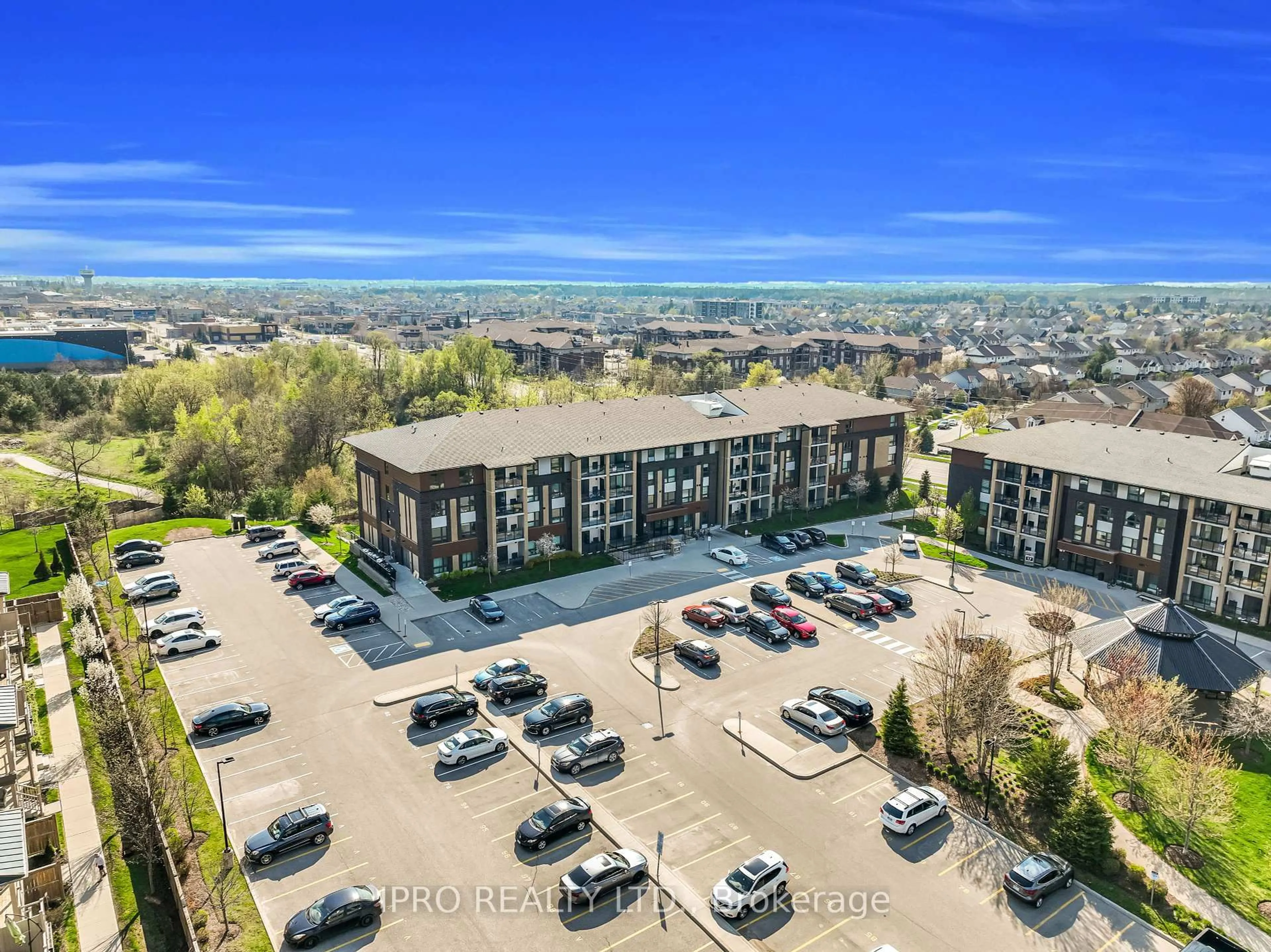 A pic from outside/outdoor area/front of a property/back of a property/a pic from drone, city buildings view from balcony for 25 Kay Cres #LL12, Guelph Ontario N1L 0P2