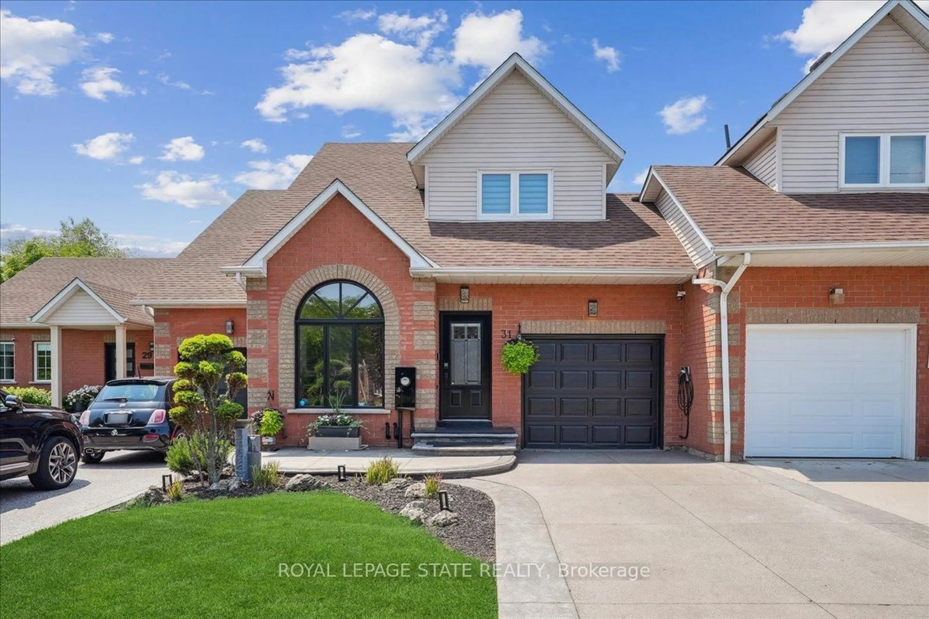 Home with brick exterior material, street for 31 Morrison Cres, Grimsby Ontario L3M 5K4