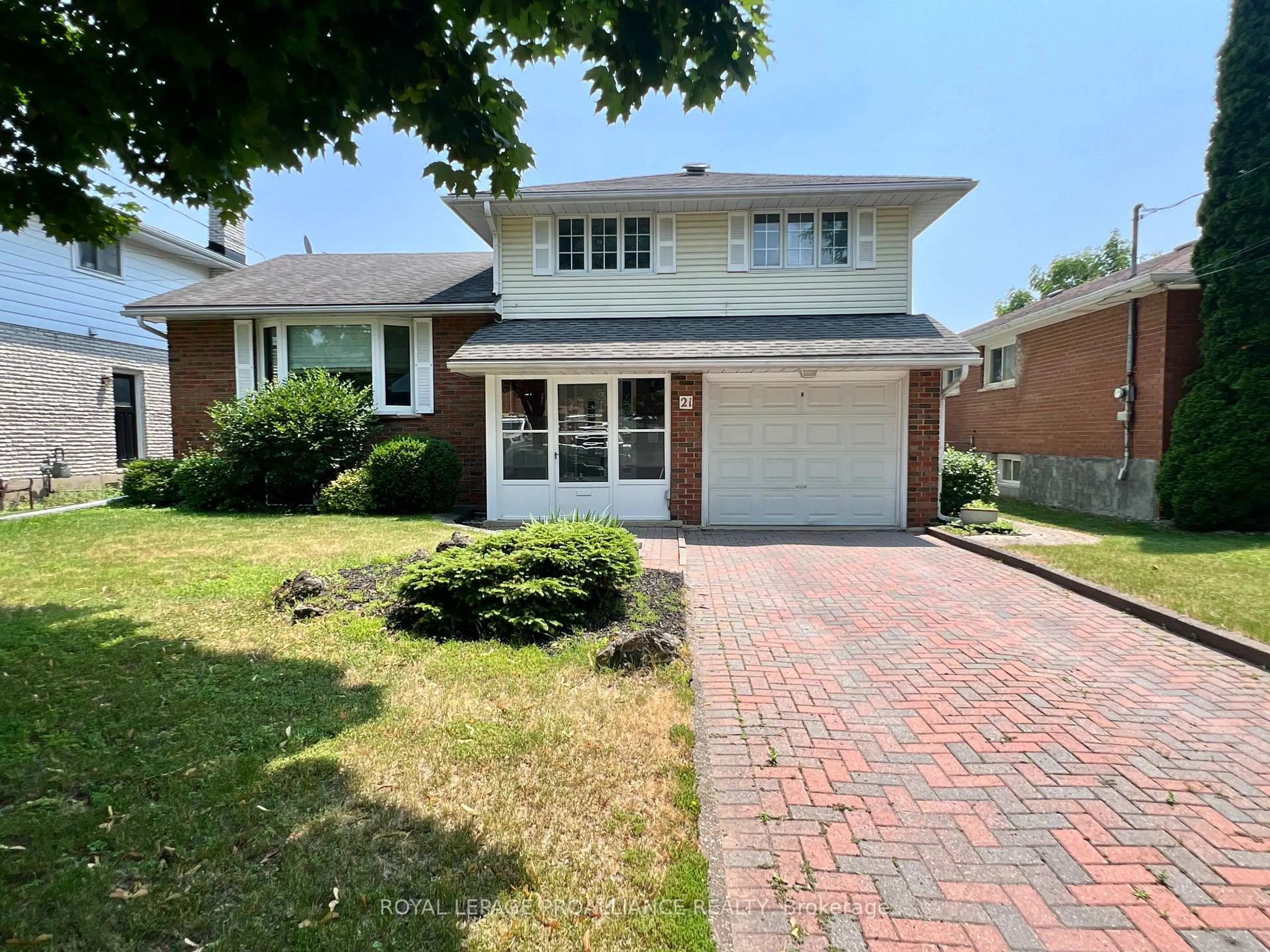 Home with brick exterior material, street for 21 Dunnett Blvd, Belleville Ontario K8P 4M7