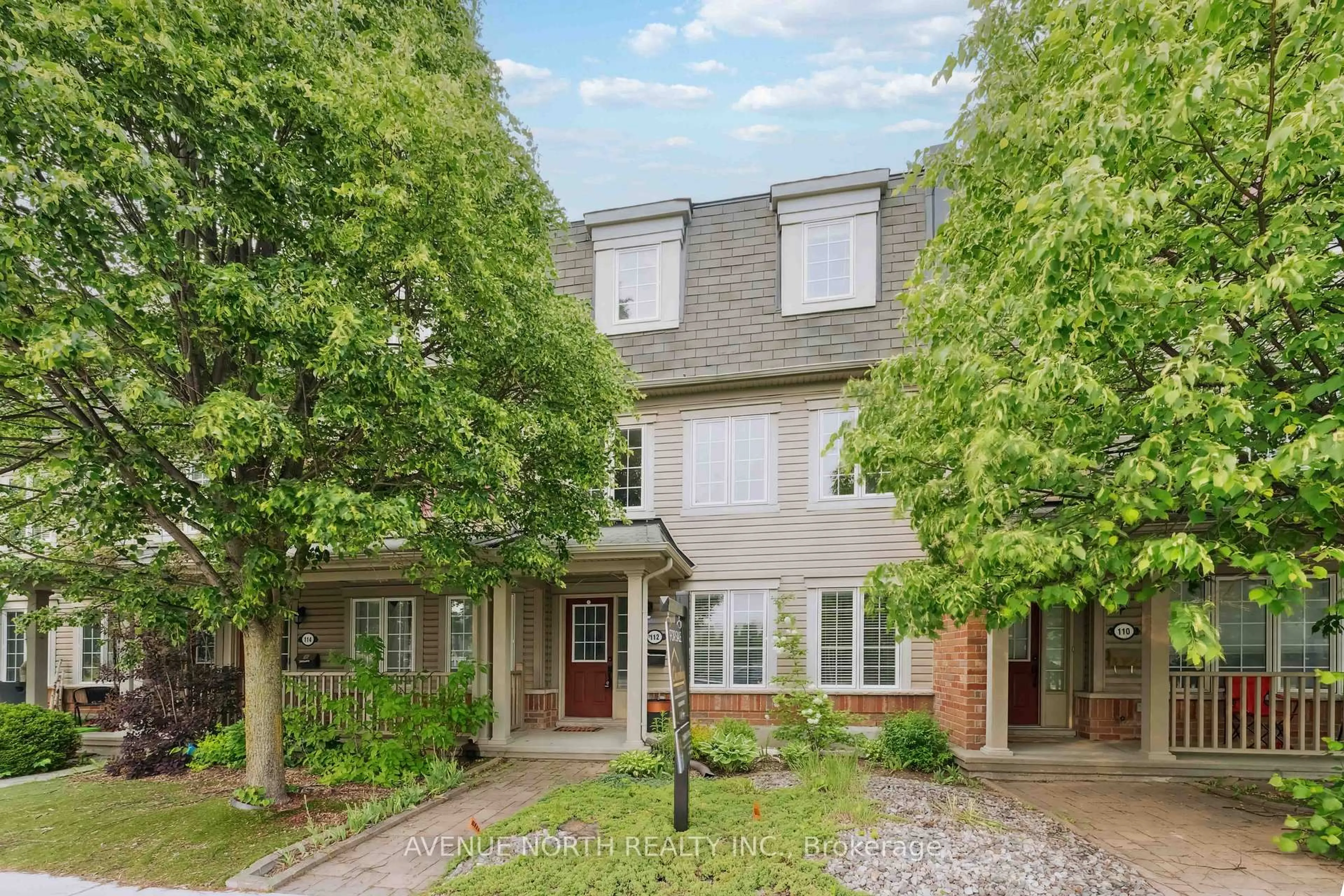 Home with brick exterior material, street for 112 Huntmar Dr, Ottawa Ontario K2S 0E3