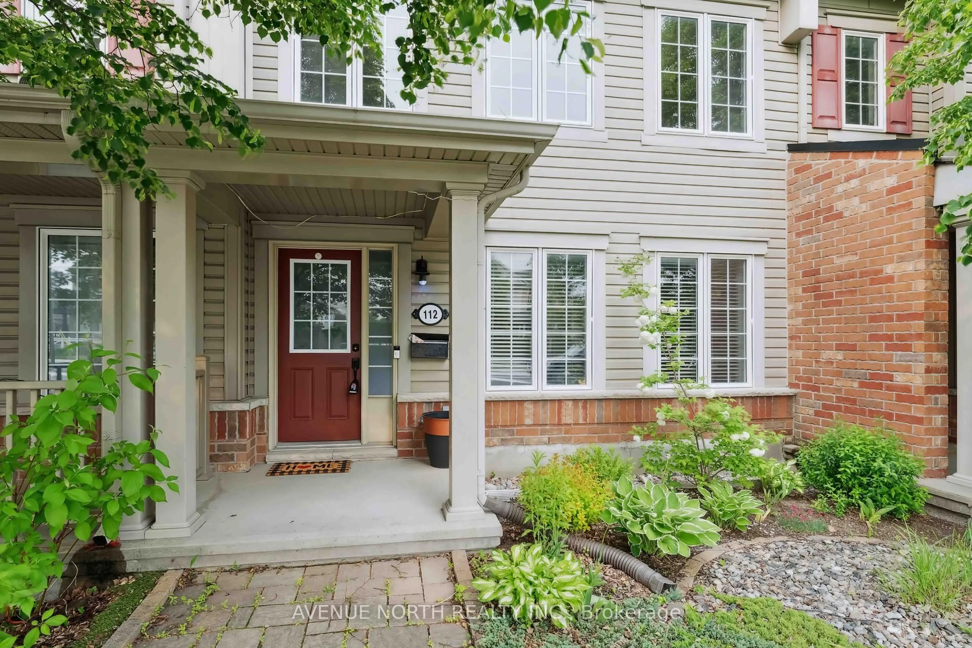 Home with brick exterior material, street for 112 Huntmar Dr, Ottawa Ontario K2S 0E3