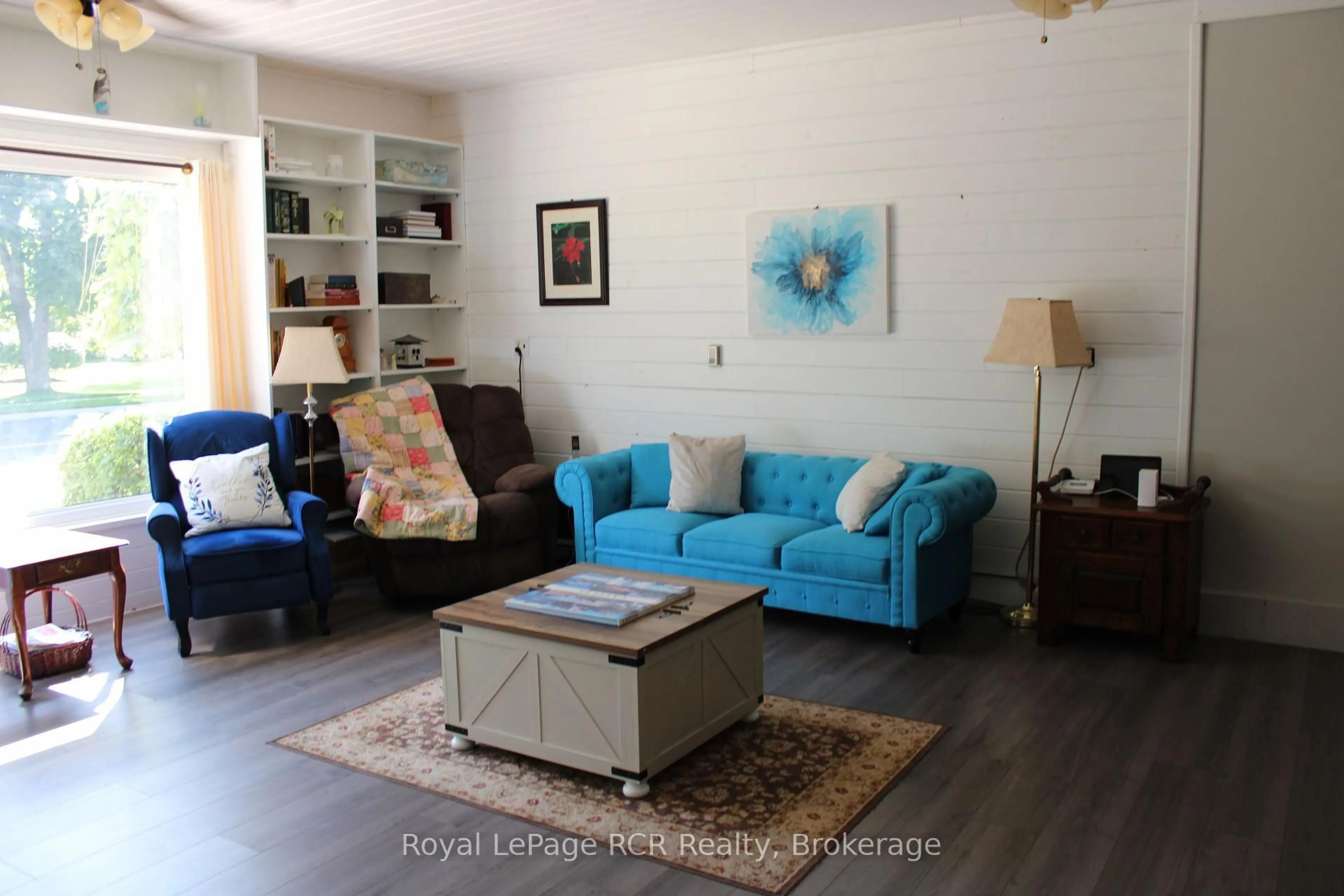 Living room with furniture, wood/laminate floor for 96 MAIN St, Northern Bruce Peninsula Ontario N0H 1W0