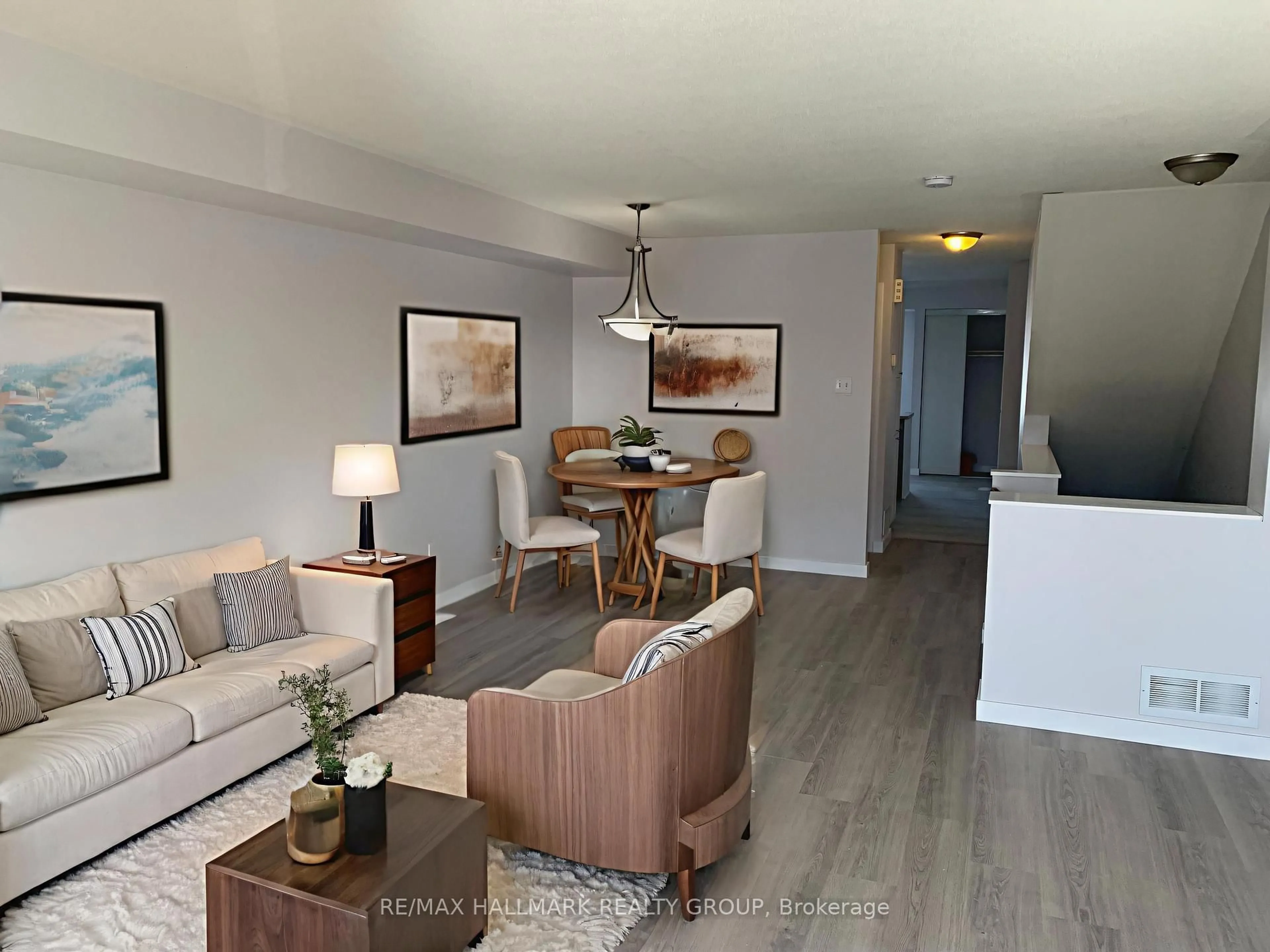 Living room with furniture, wood/laminate floor for 281 Aquaview Dr, Ottawa Ontario K4A 0B6