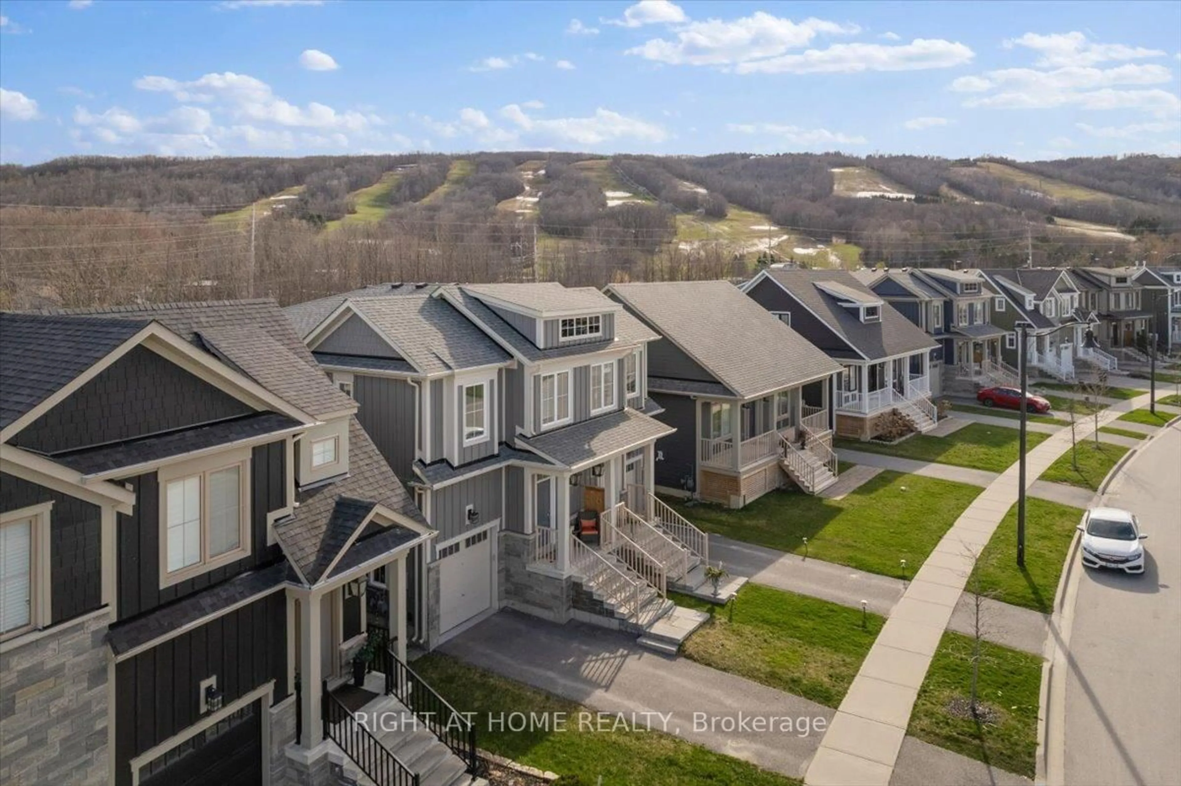 A pic from outside/outdoor area/front of a property/back of a property/a pic from drone, mountain view for 206 Yellow Birch Cres, Blue Mountains Ontario L9Y 0Z3