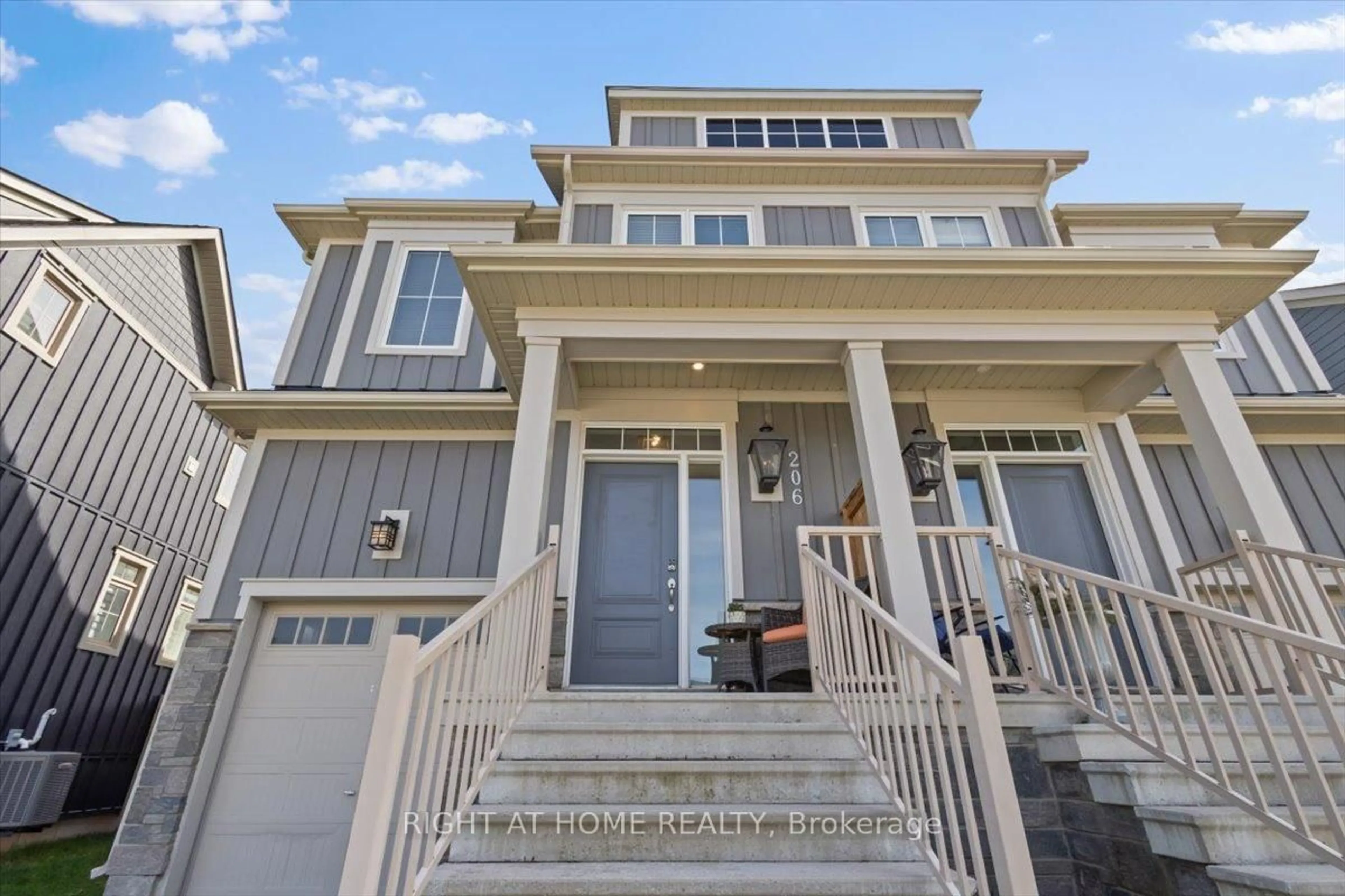 Home with vinyl exterior material, street for 206 Yellow Birch Cres, Blue Mountains Ontario L9Y 0Z3