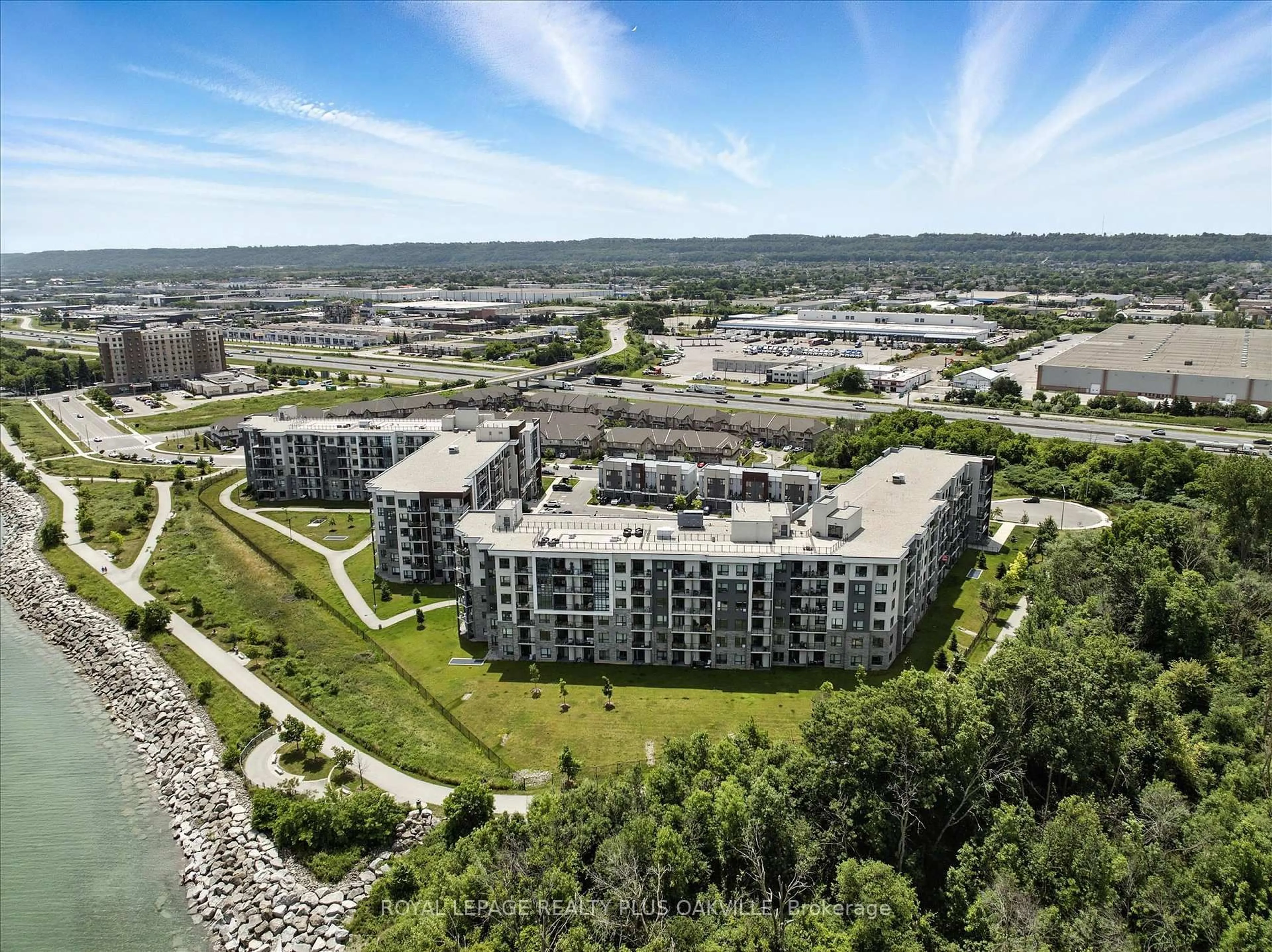 A pic from outside/outdoor area/front of a property/back of a property/a pic from drone, unknown for 125 Shoreview Pl #316, Hamilton Ontario L8E 0K3