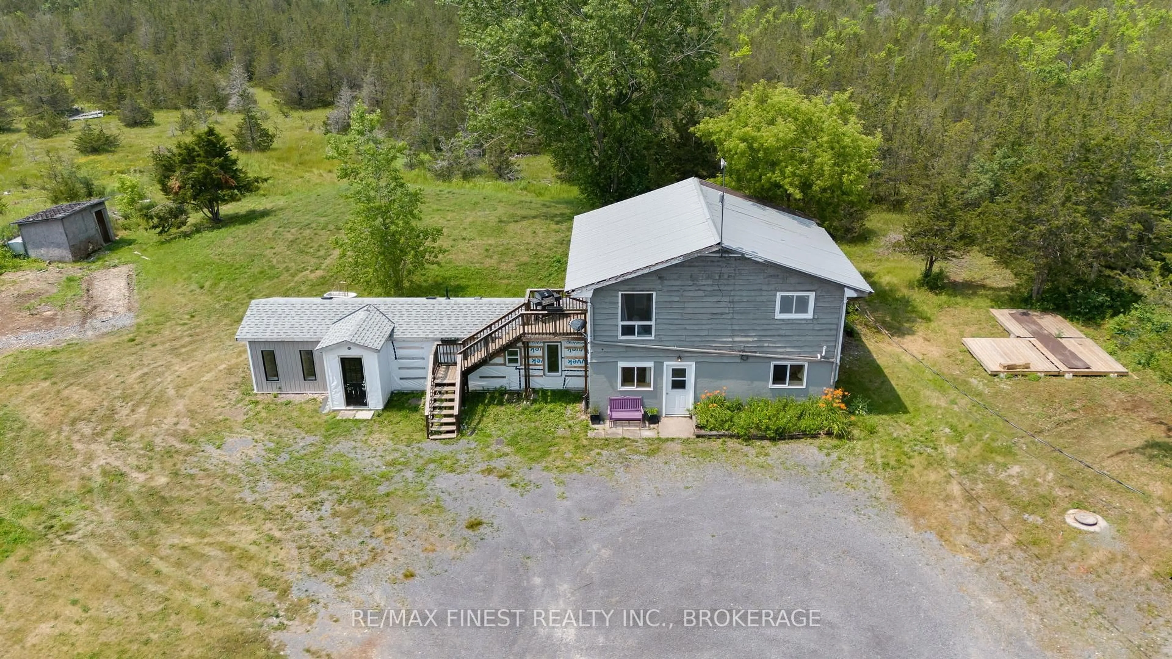 A pic from outside/outdoor area/front of a property/back of a property/a pic from drone, building for 780 Wing Rd, Bissett Creek Ontario K0H 2H0