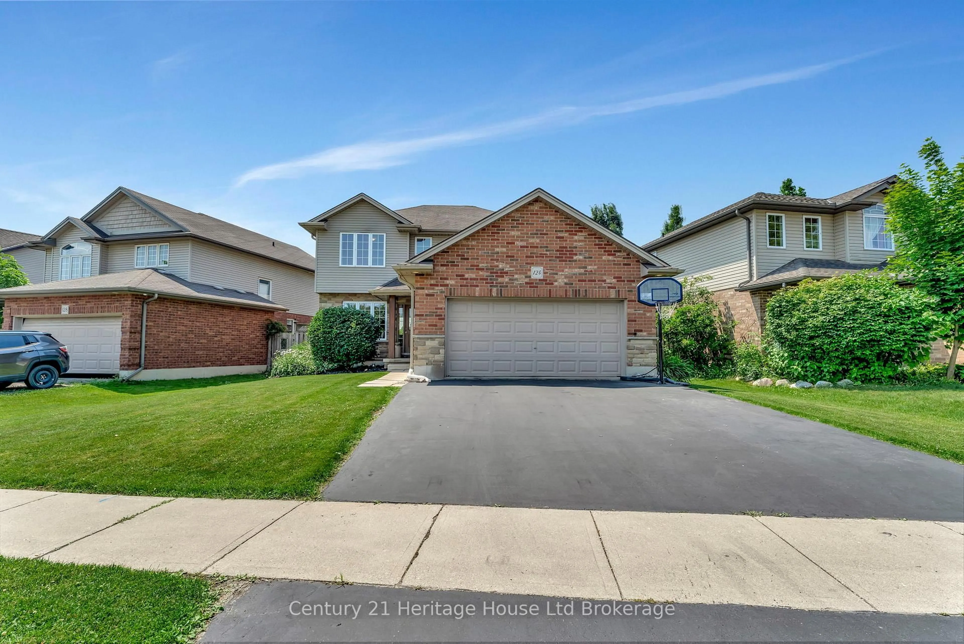 Home with brick exterior material, street for 124 Cardinal Dr, Woodstock Ontario N4T 0A1