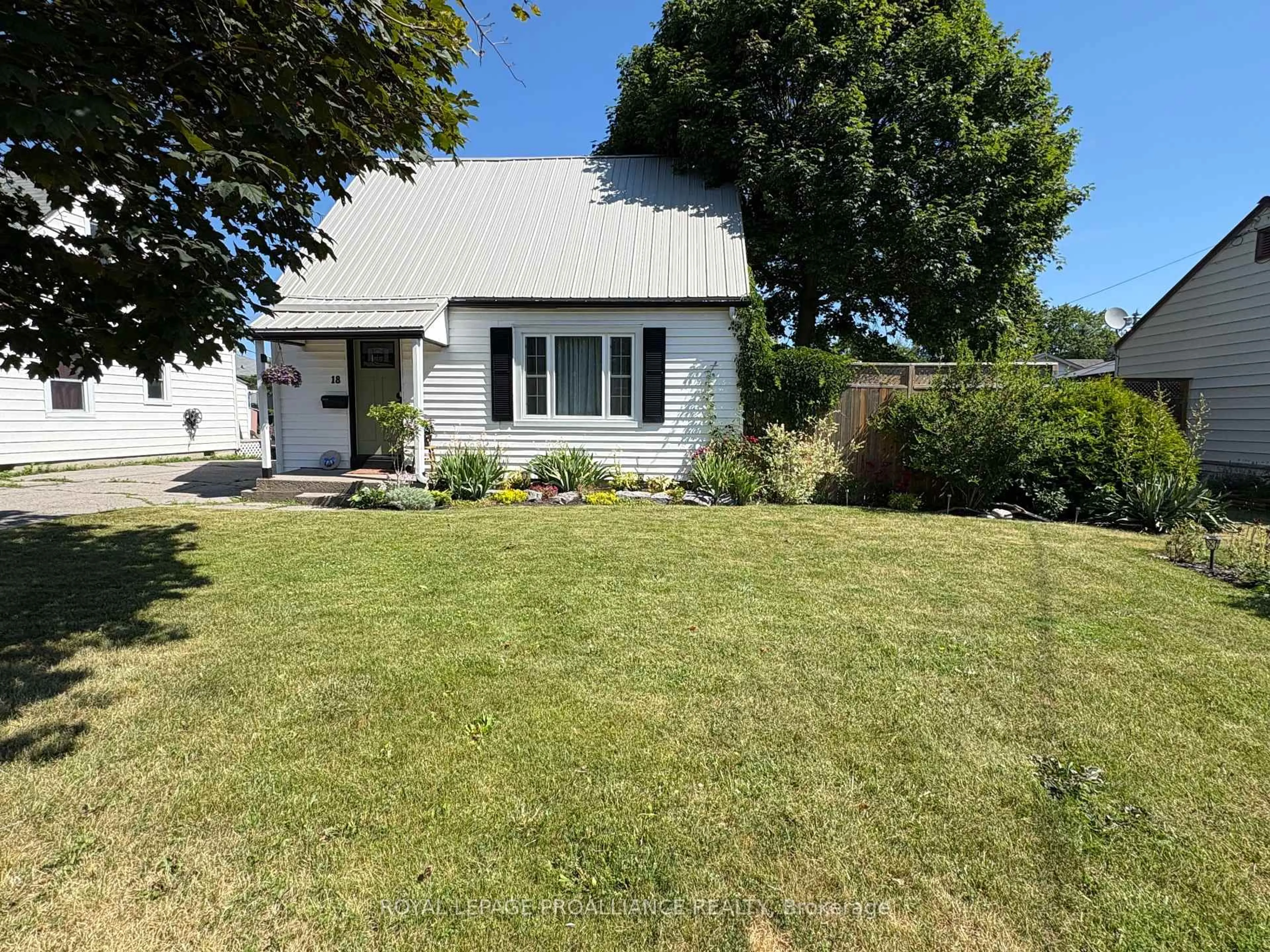 A pic from outside/outdoor area/front of a property/back of a property/a pic from drone, street for 18 Wilson Cres, Quinte West Ontario K8V 1Y2