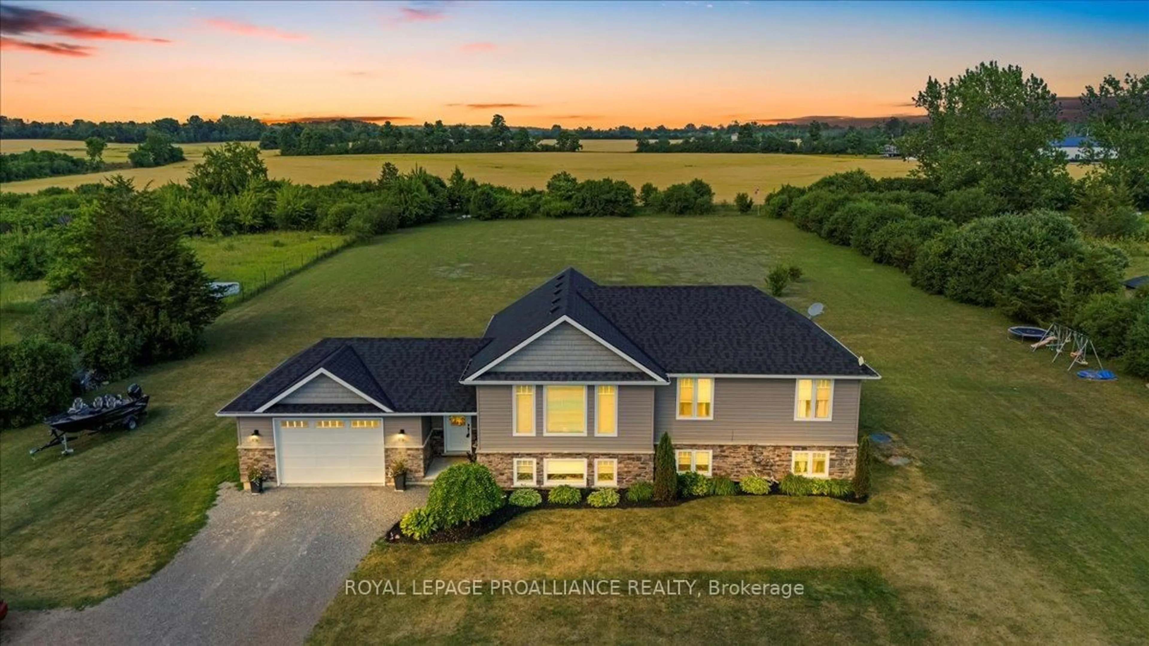 A pic from outside/outdoor area/front of a property/back of a property/a pic from drone, water/lake/river/ocean view for 20846 Loyalist Parkway, Prince Edward County Ontario K0K 1T0