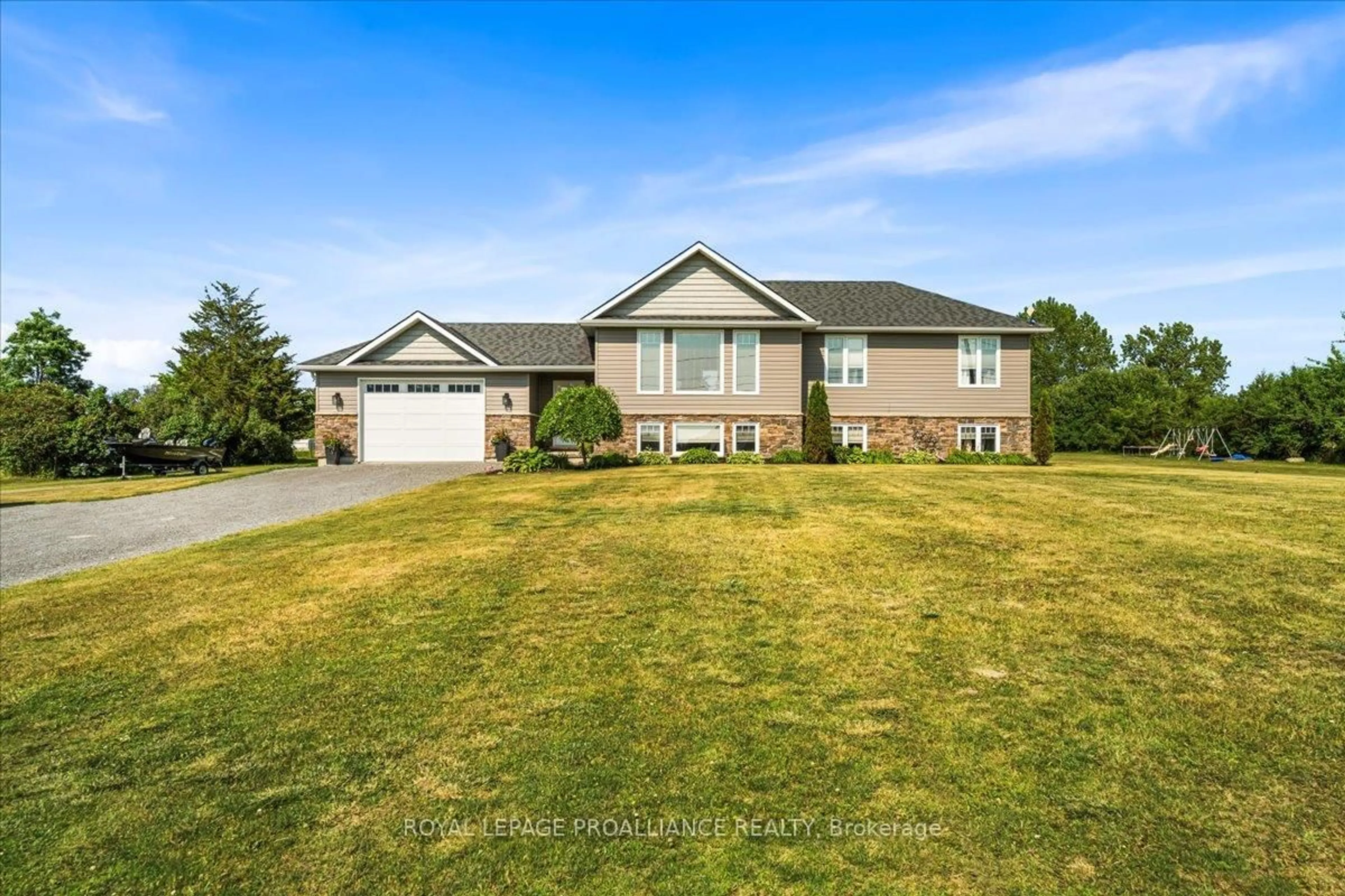 Home with vinyl exterior material, street for 20846 Loyalist Parkway, Prince Edward County Ontario K0K 1T0