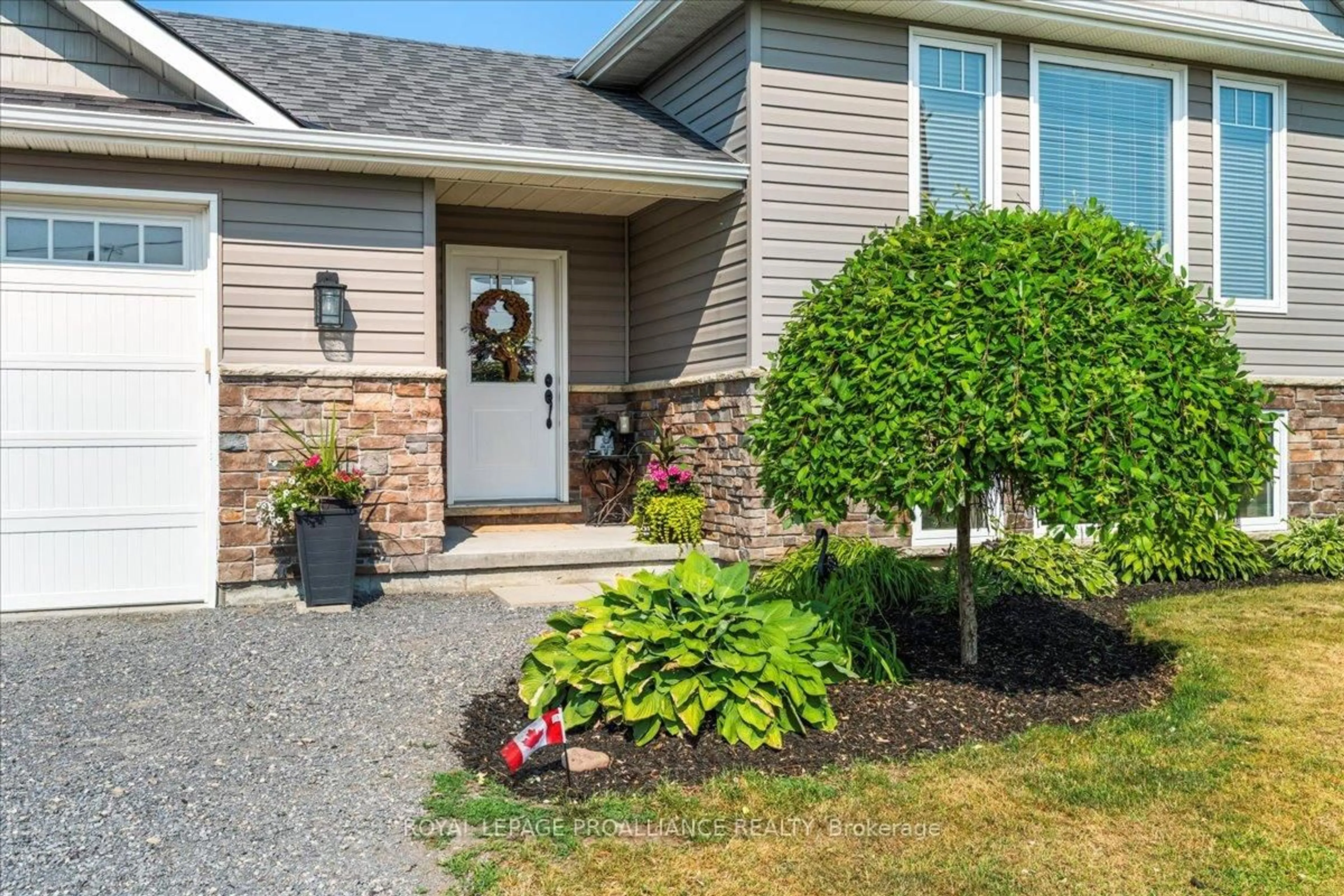Home with vinyl exterior material, street for 20846 Loyalist Parkway, Prince Edward County Ontario K0K 1T0