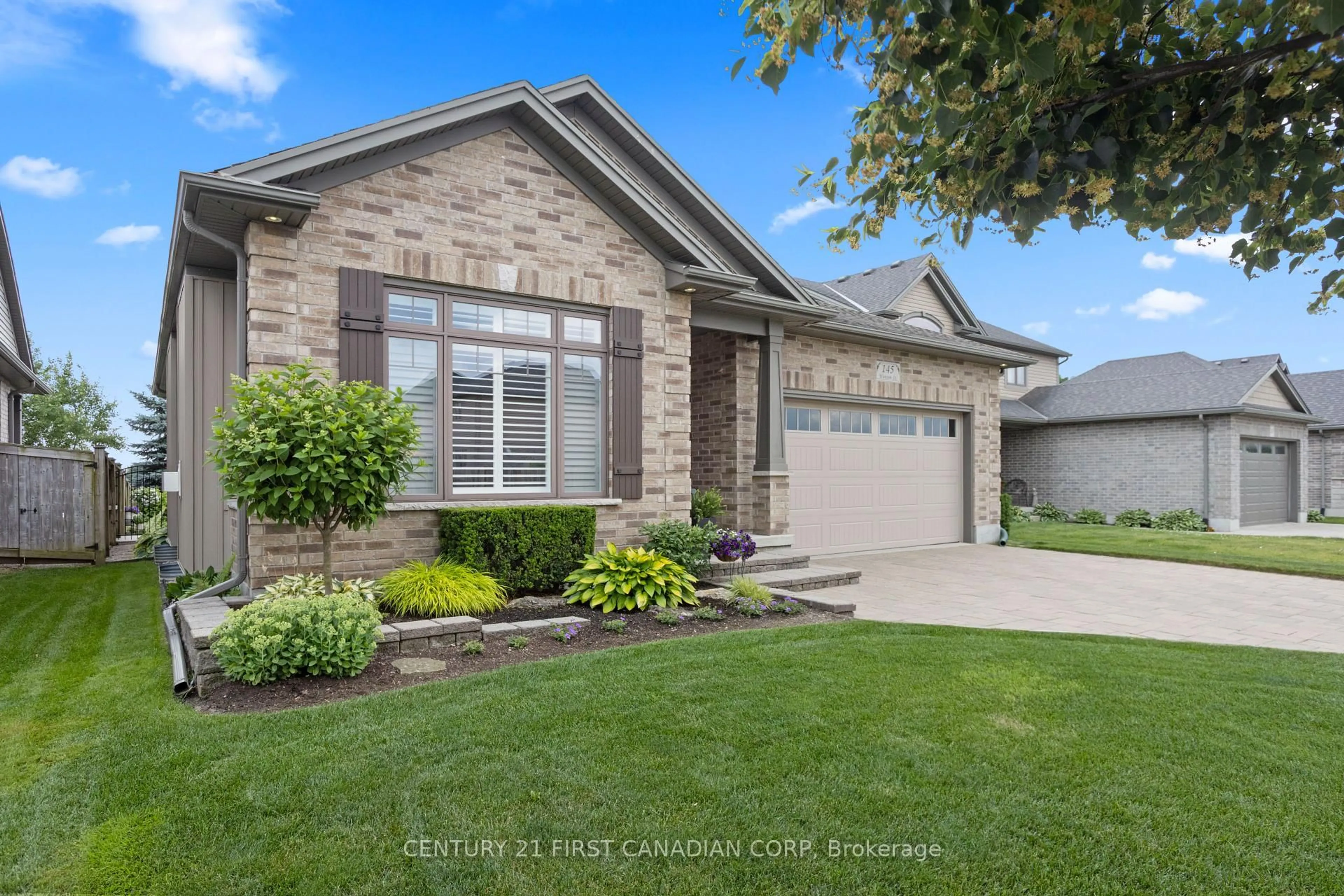 Home with brick exterior material, street for 145 Watson St, Lucan Biddulph Ontario N0M 2A0