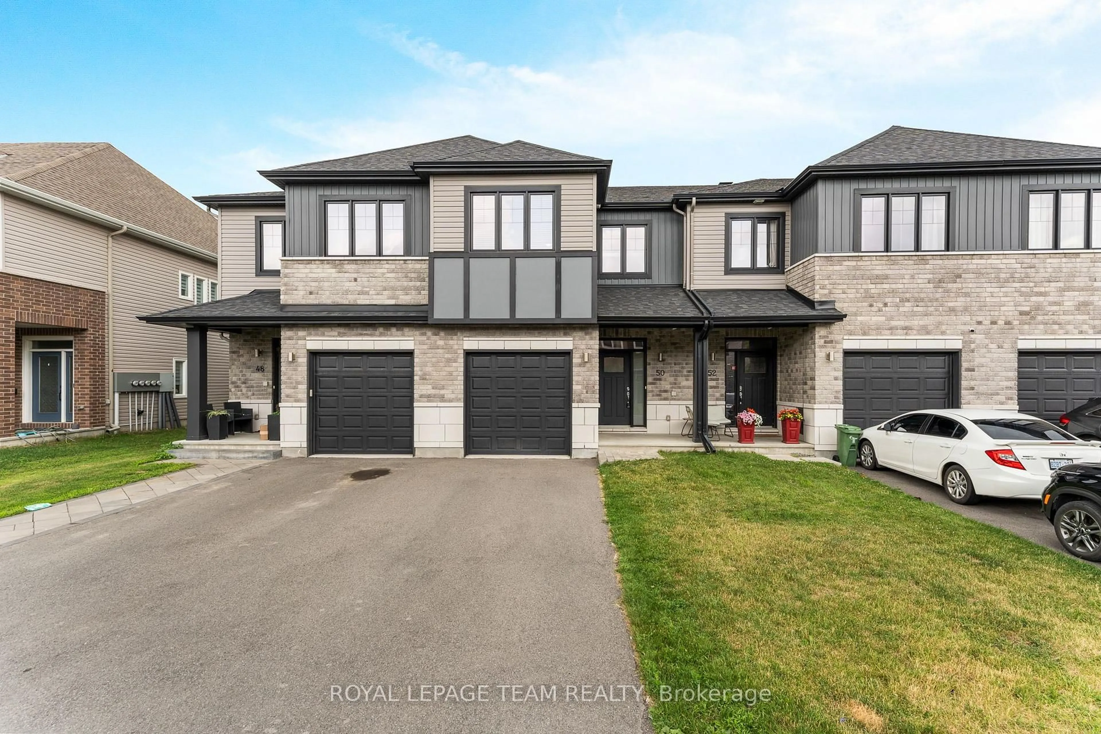 A pic from outside/outdoor area/front of a property/back of a property/a pic from drone, street for 50 Jardiniere St, Ottawa Ontario K2S 2K3