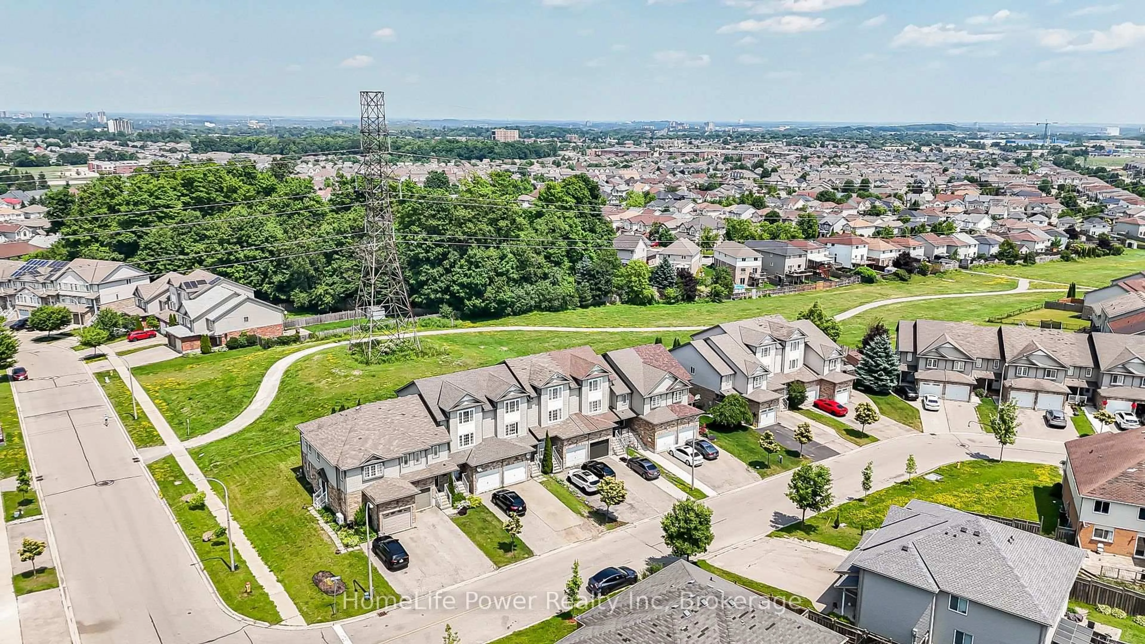 A pic from outside/outdoor area/front of a property/back of a property/a pic from drone, unknown for 9 red clover Cres, Kitchener Ontario N2E 4G9