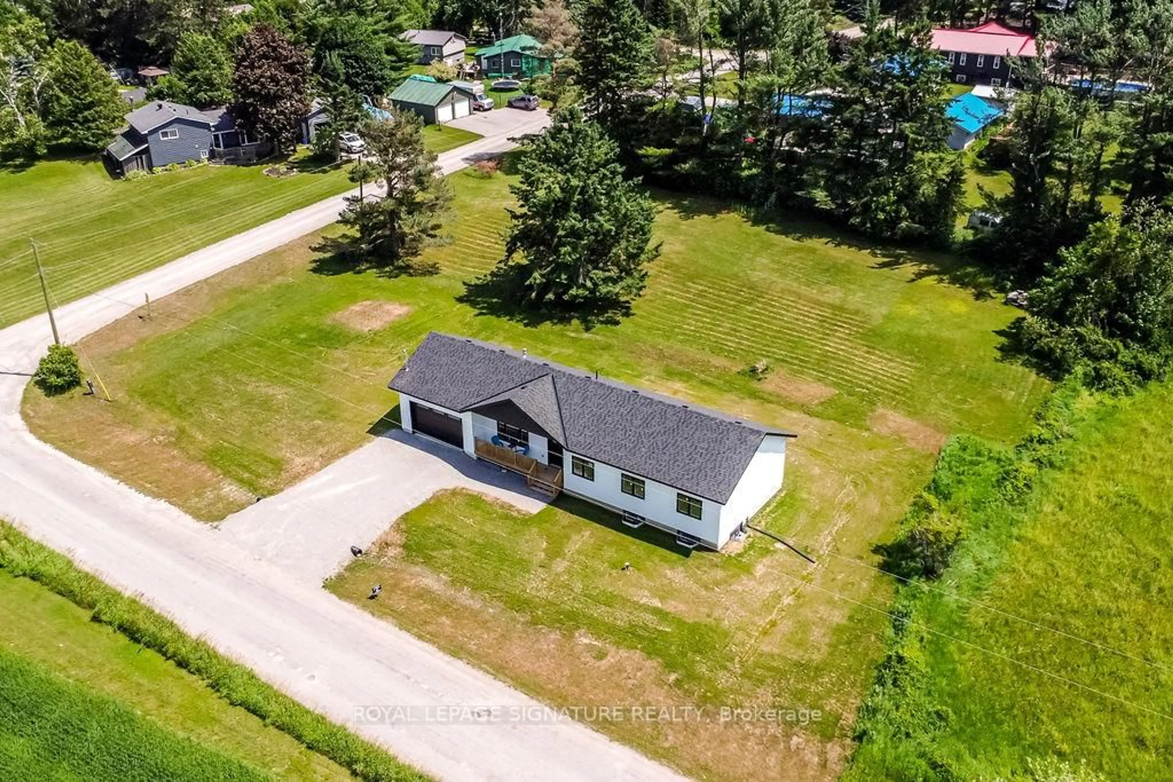 A pic from outside/outdoor area/front of a property/back of a property/a pic from drone, unknown for 122 Day Dr, Kawartha Lakes Ontario L3V 6H5