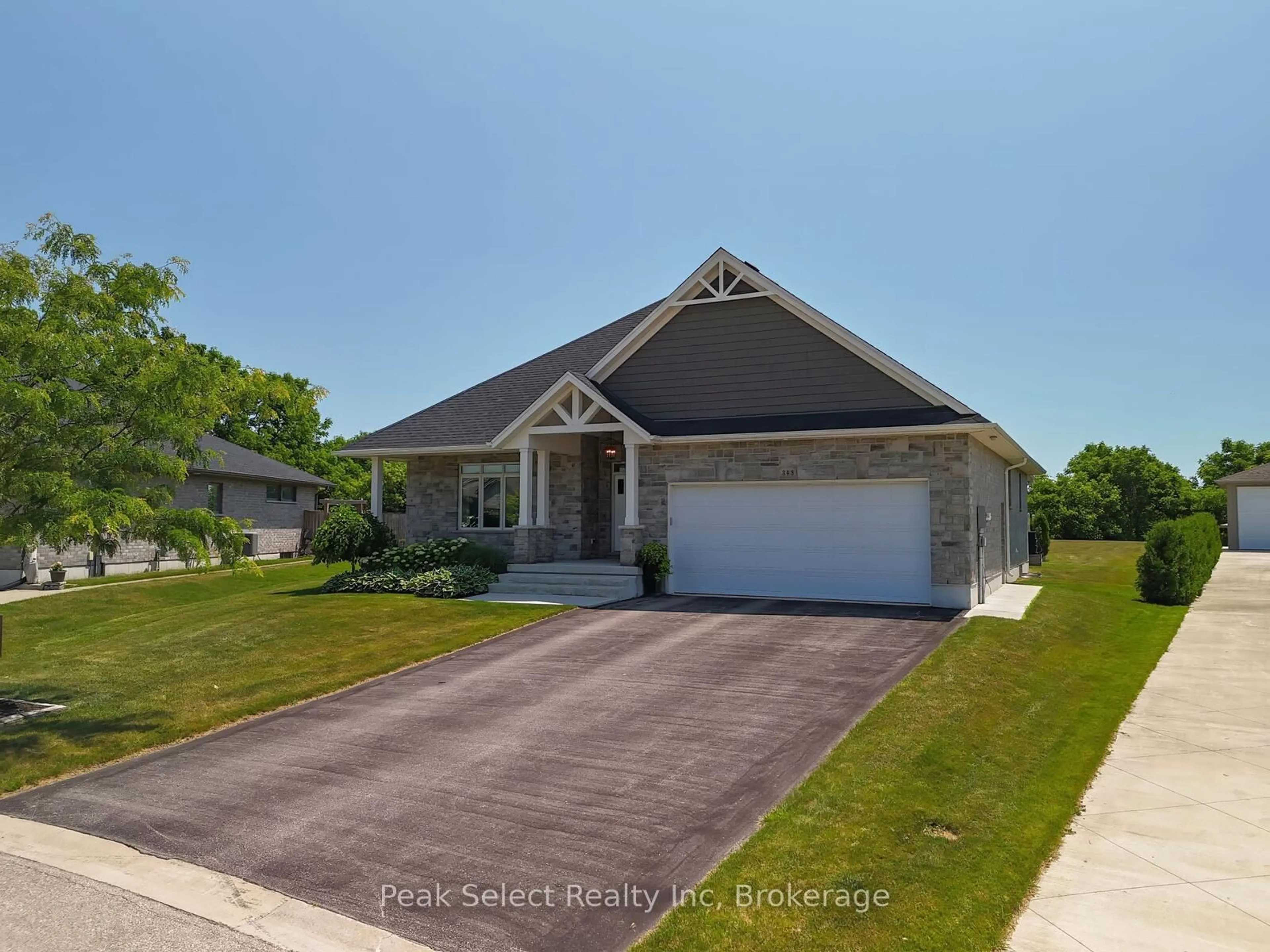 Home with vinyl exterior material, street for 343 TRACY St, St. Marys Ontario N4X 0B4