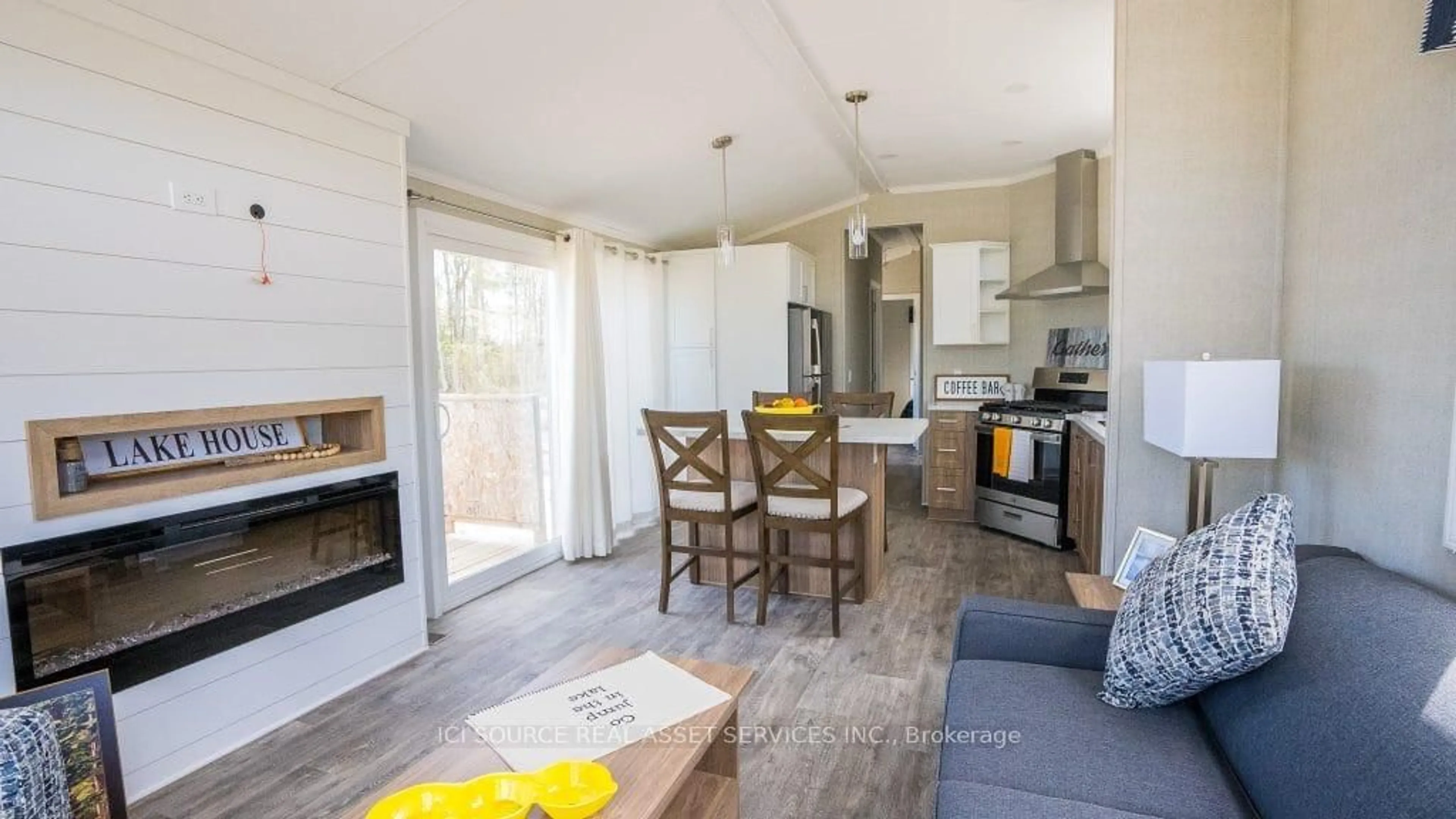 Open concept kitchen, wood/laminate floor for 1047 Bonnie Lake Camp Rd #WINDSOR, Bracebridge Ontario P1L 1W9