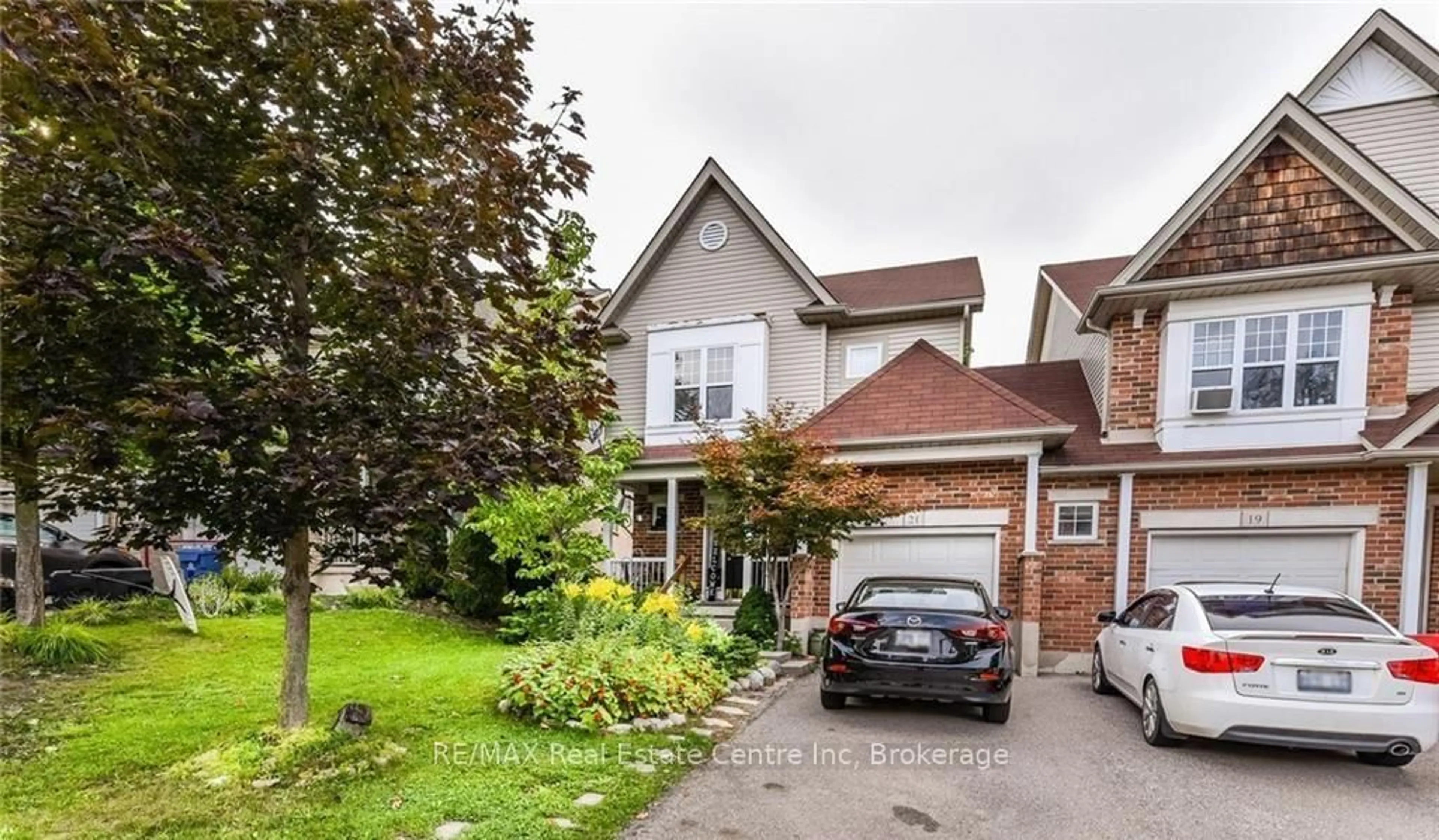 Home with brick exterior material, street for 21 Truesdale Cres, Guelph Ontario N1G 5H4