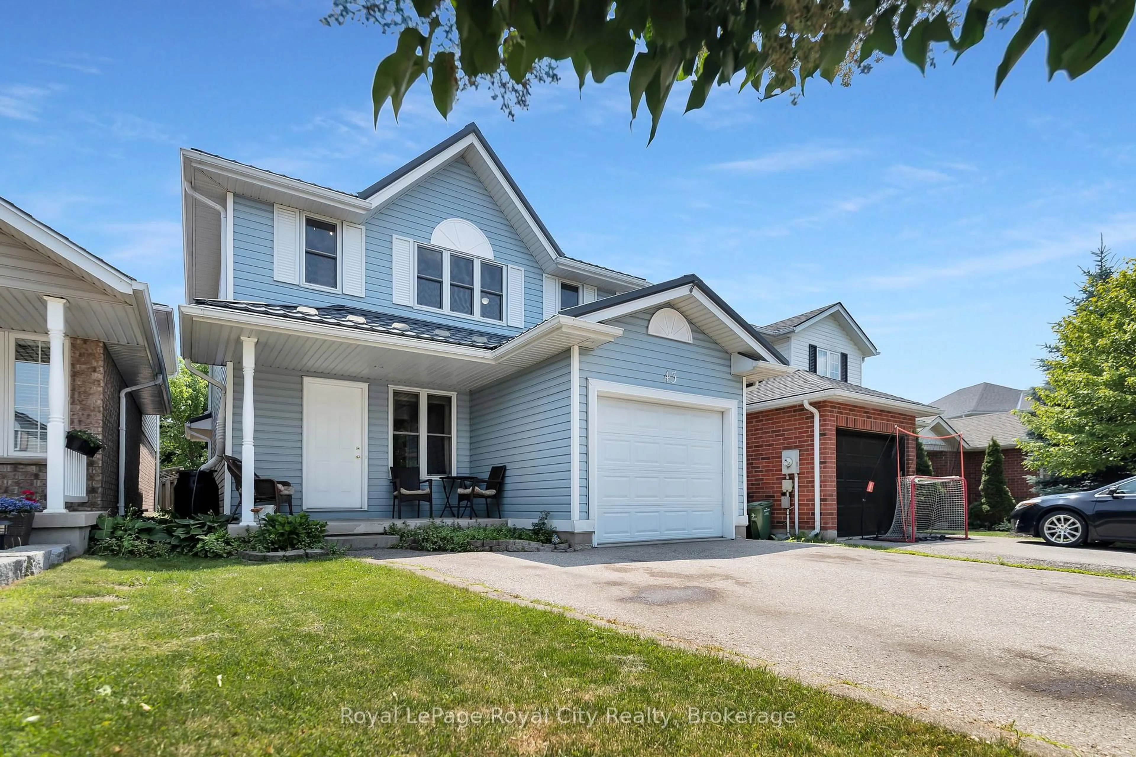 Home with vinyl exterior material, street for 43 Hagan Ave, Guelph Ontario N1E 7B7