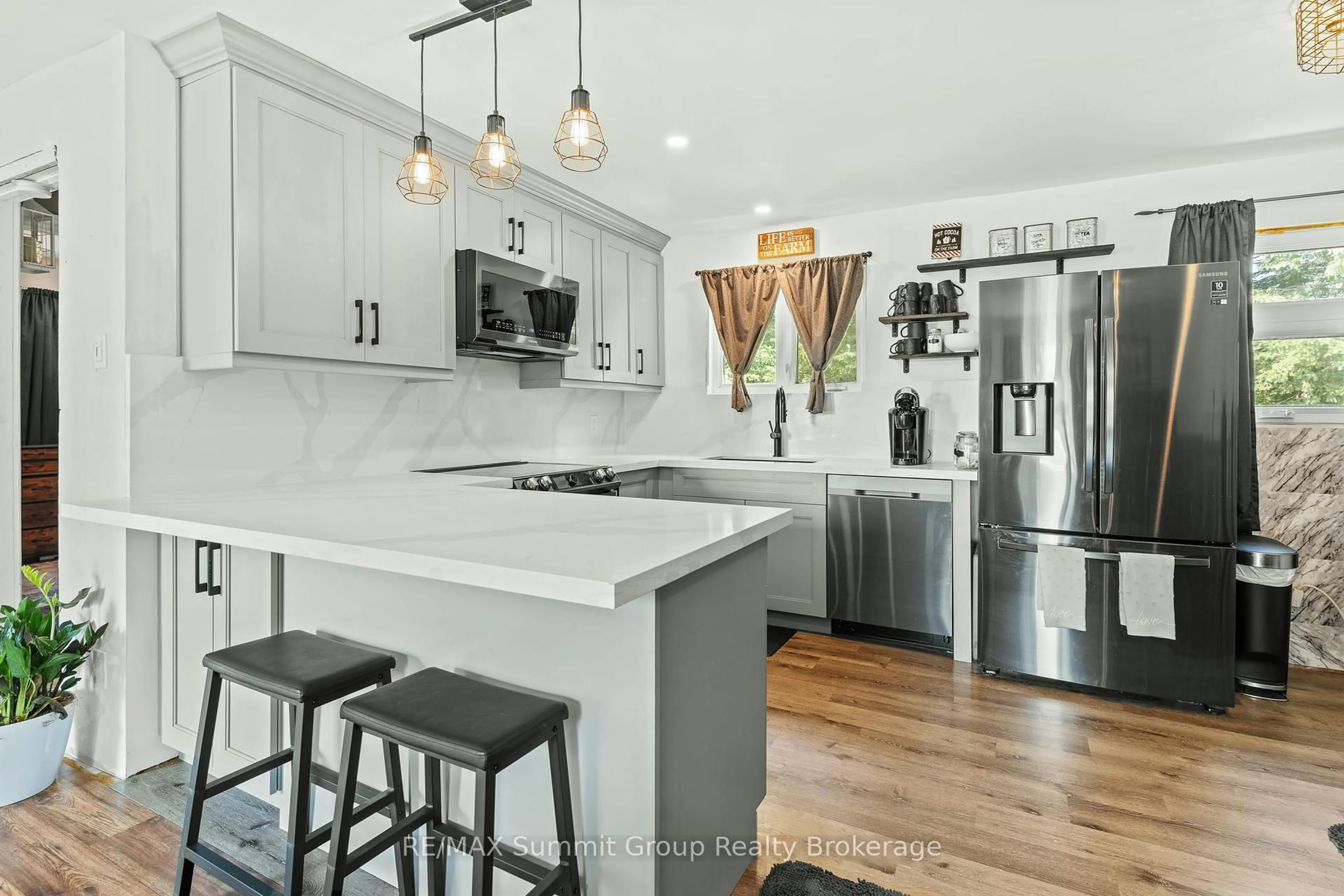Open concept kitchen, ceramic/tile floor for 554014 Road 55, Grey Highlands Ontario N0C 1M0