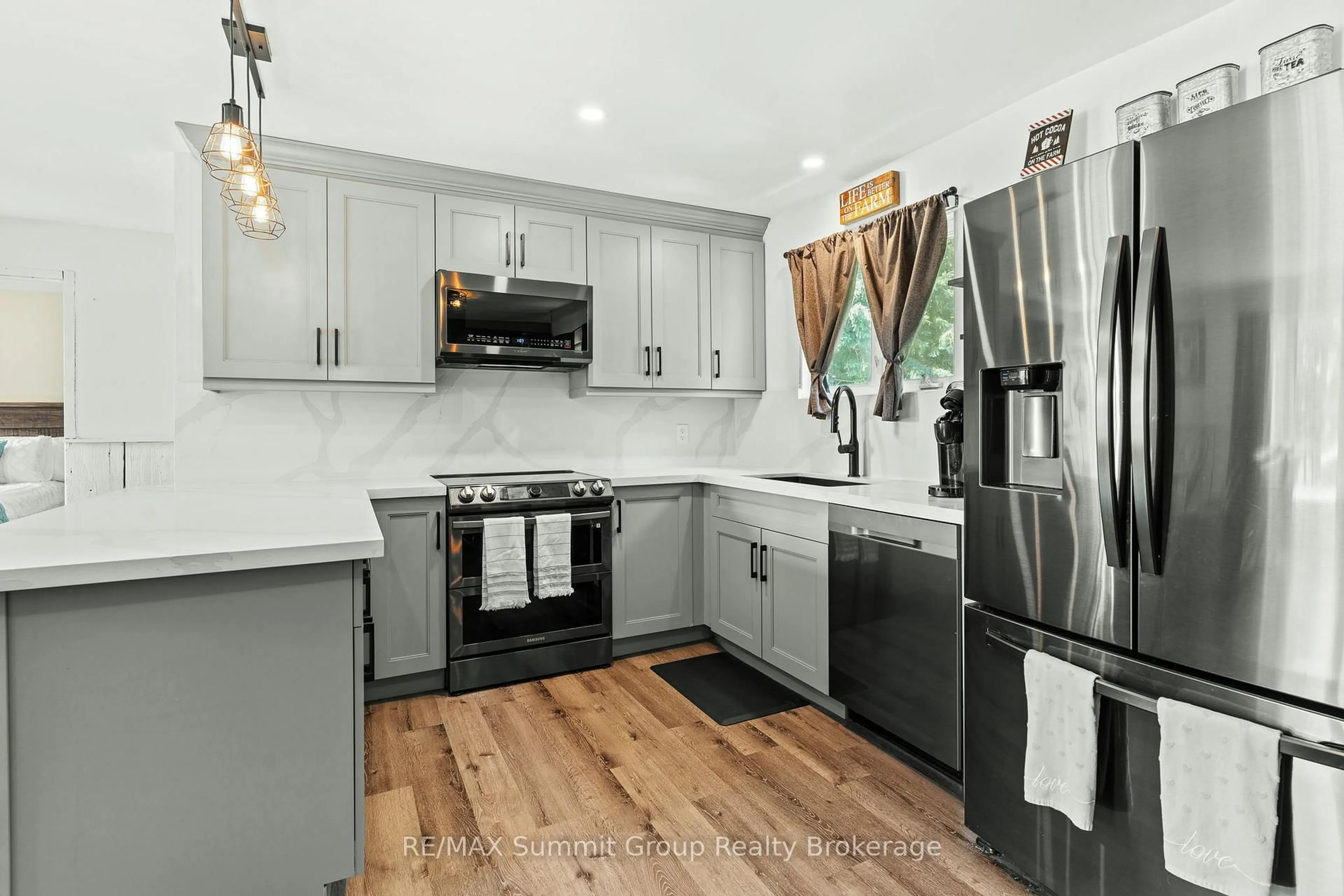 Open concept kitchen, ceramic/tile floor for 554014 Road 55, Grey Highlands Ontario N0C 1M0