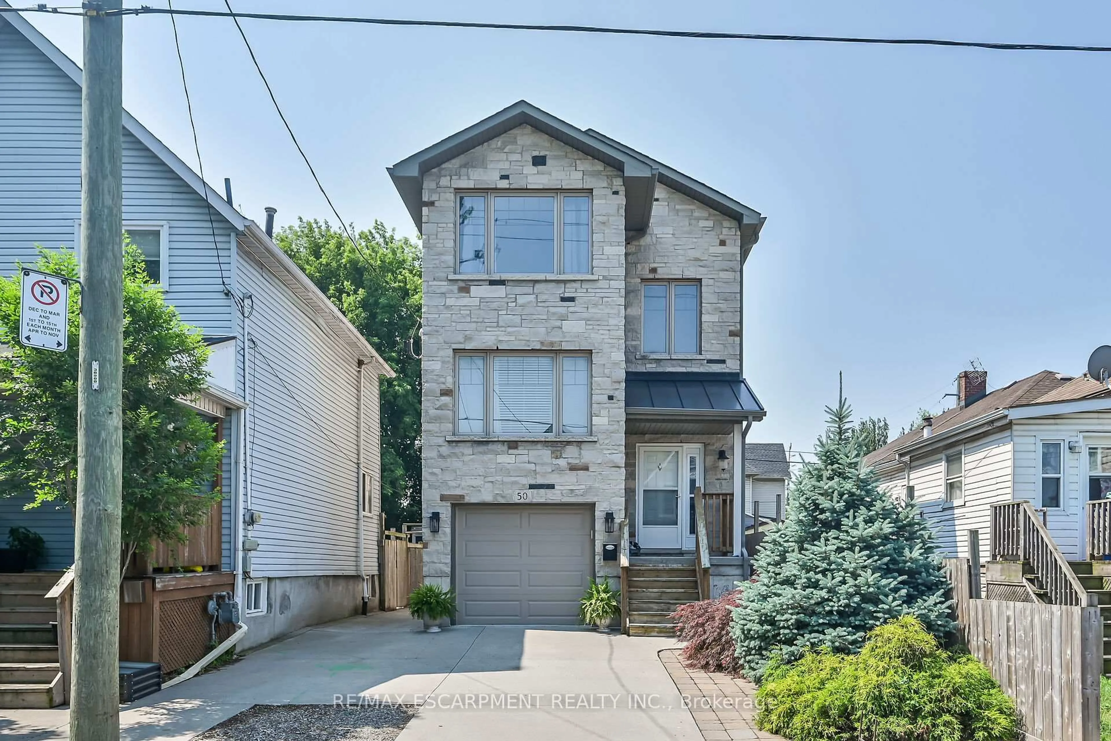 Home with brick exterior material, street for 50 Keith St, Hamilton Ontario L8L 3S1