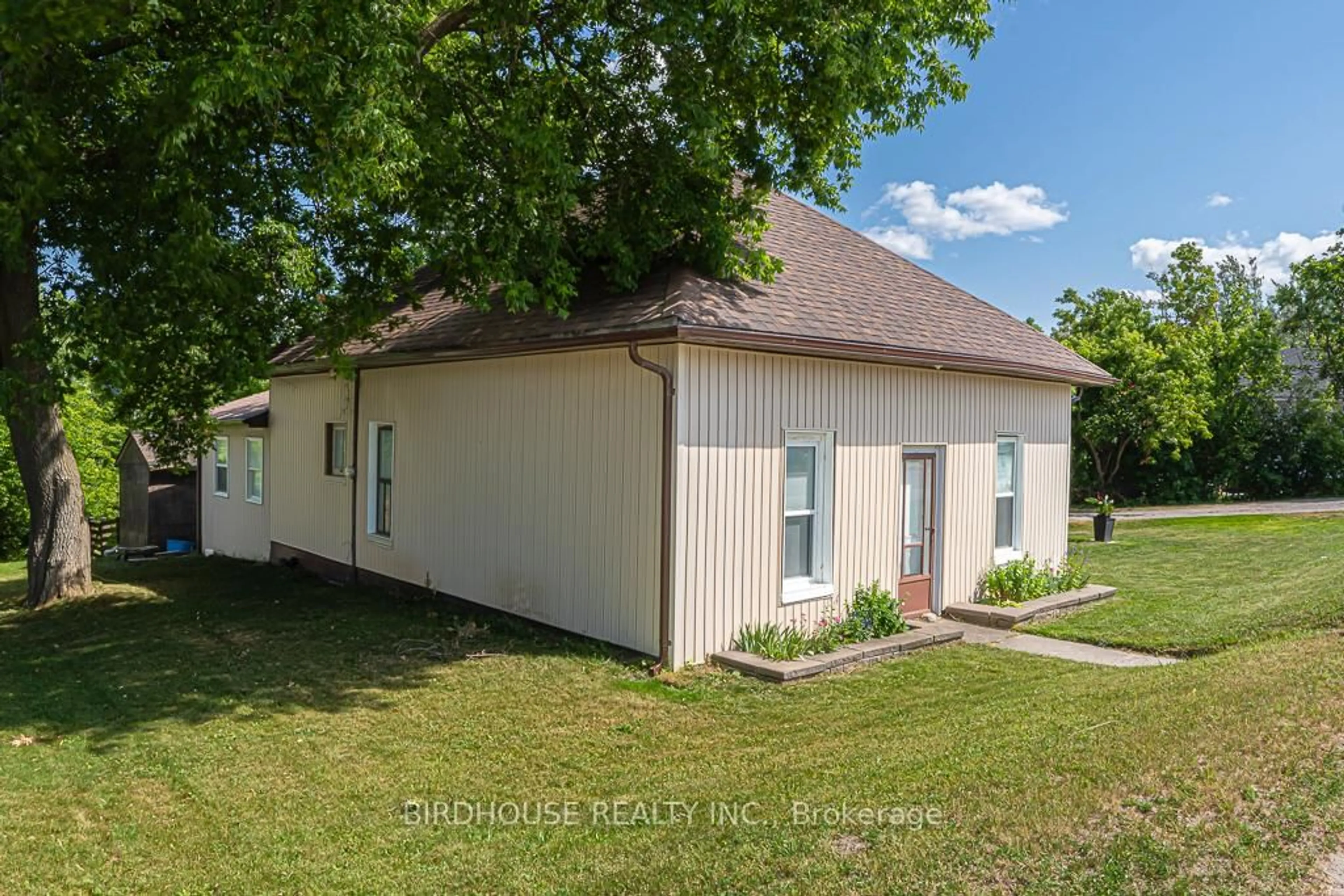 A pic from outside/outdoor area/front of a property/back of a property/a pic from drone, street for 4094 Highway 35, Kawartha Lakes Ontario K0M 1G0