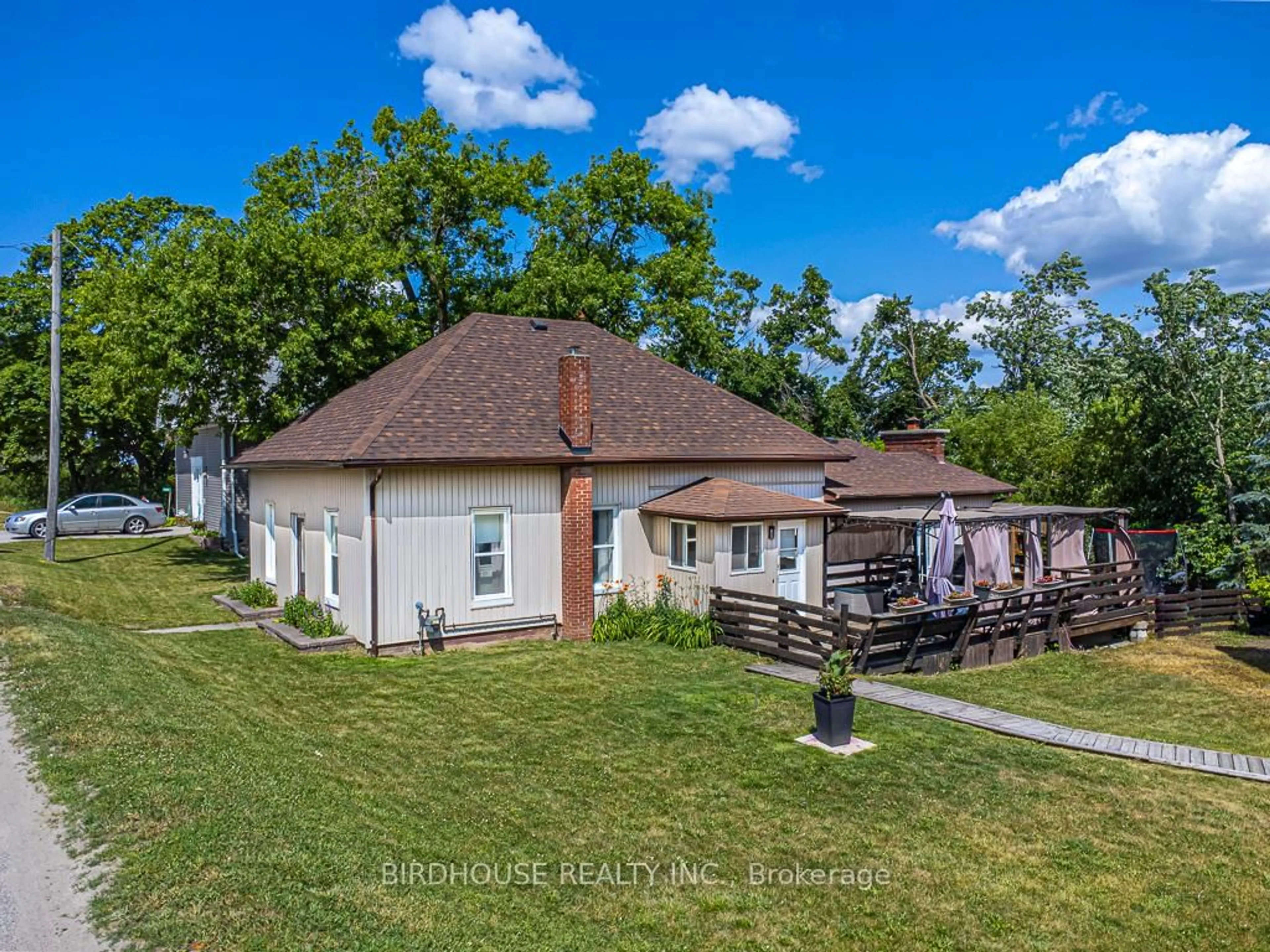 A pic from outside/outdoor area/front of a property/back of a property/a pic from drone, street for 4094 Highway 35, Kawartha Lakes Ontario K0M 1G0