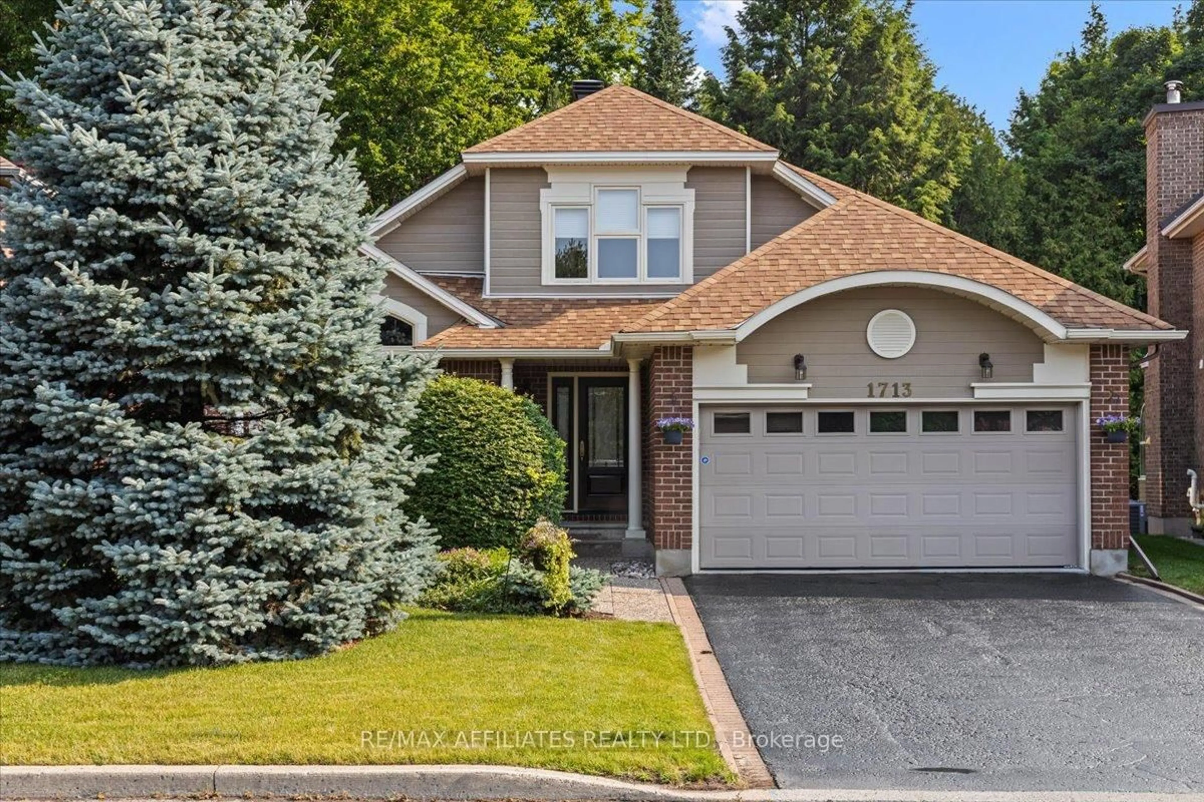Home with brick exterior material, street for 1713 Autumn Ridge Dr, Orleans Ontario K1C 6Y6