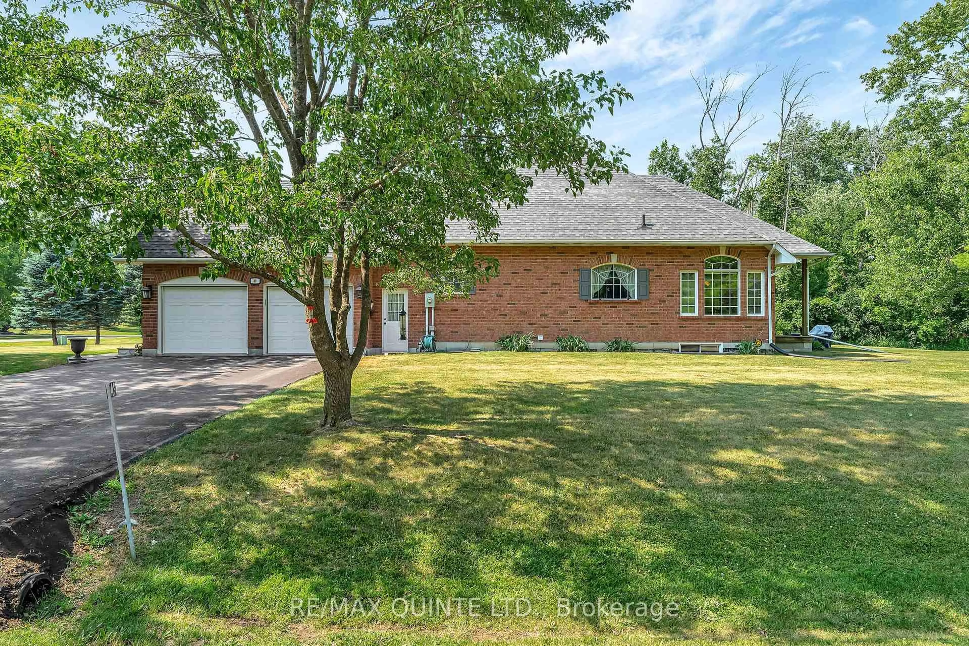 Home with brick exterior material, street for 49 Penny Lane, Belleville Ontario K8N 4Z4