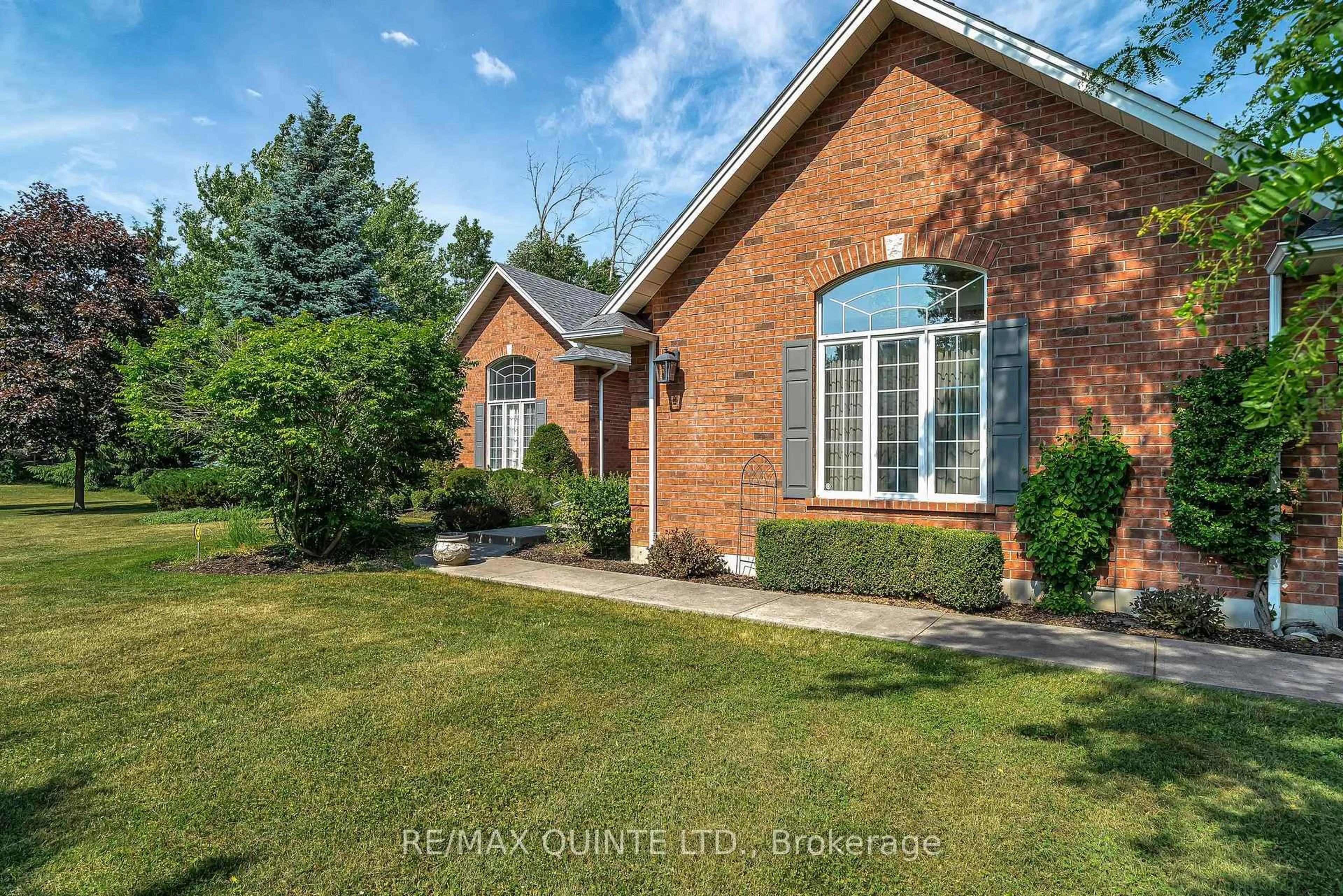 Home with brick exterior material, street for 49 Penny Lane, Belleville Ontario K8N 4Z4