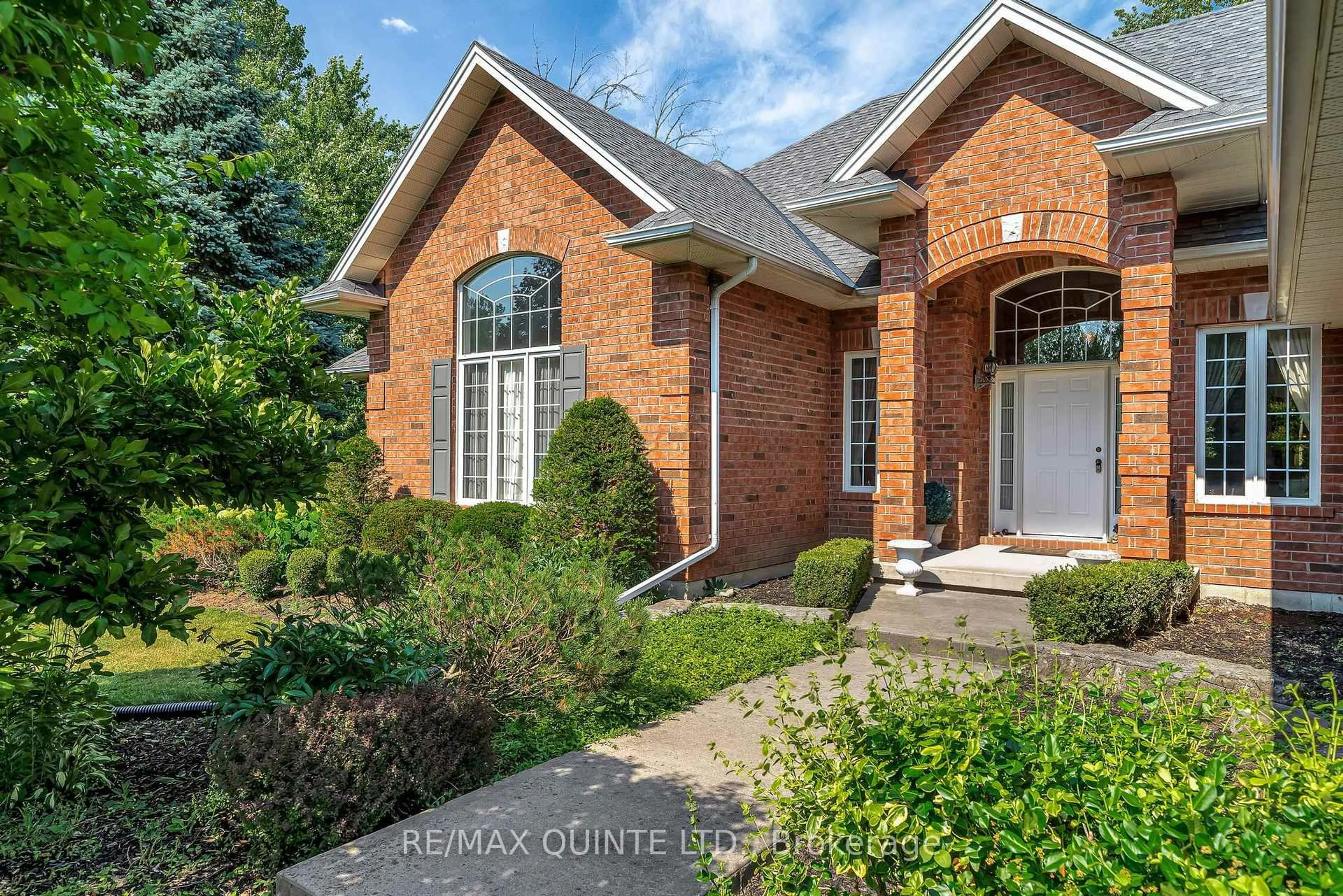 Home with brick exterior material, street for 49 Penny Lane, Belleville Ontario K8N 4Z4