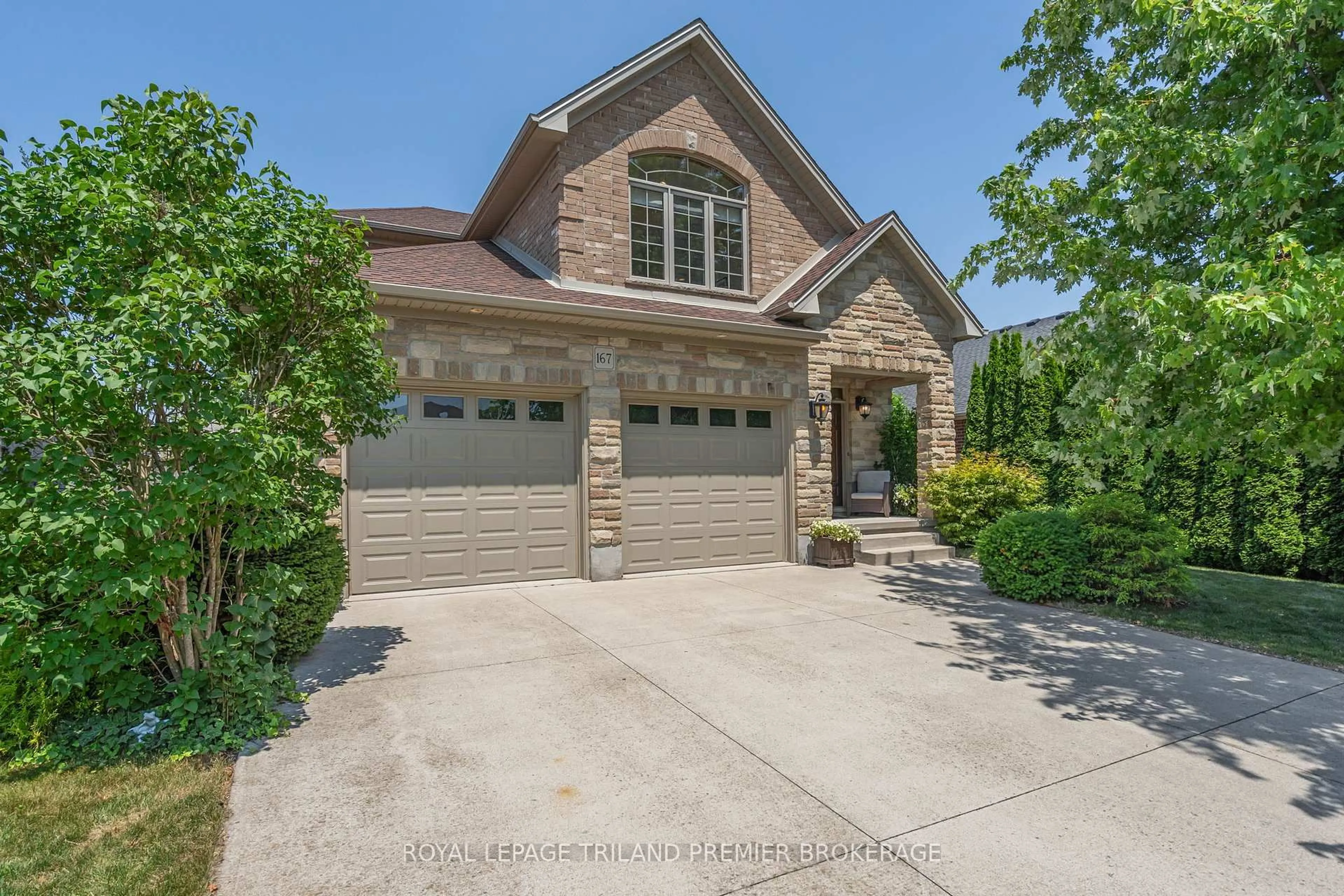 Home with brick exterior material, street for 167 Lake Margaret Tr, St. Thomas Ontario N5R 6M5